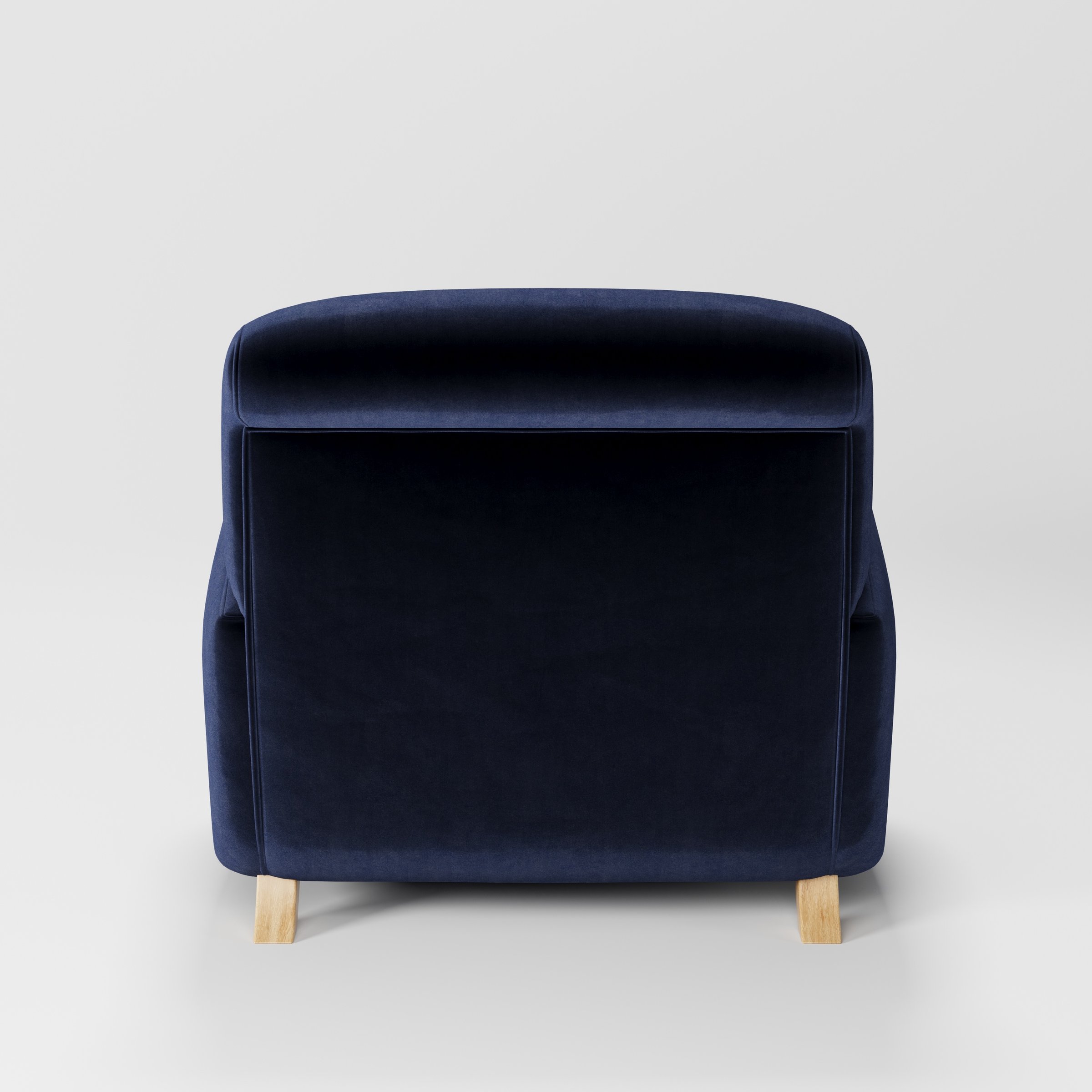 Rye armchair in Noss Velvet Navy shown from the rear highlighting backrest shape and upholstery finish.