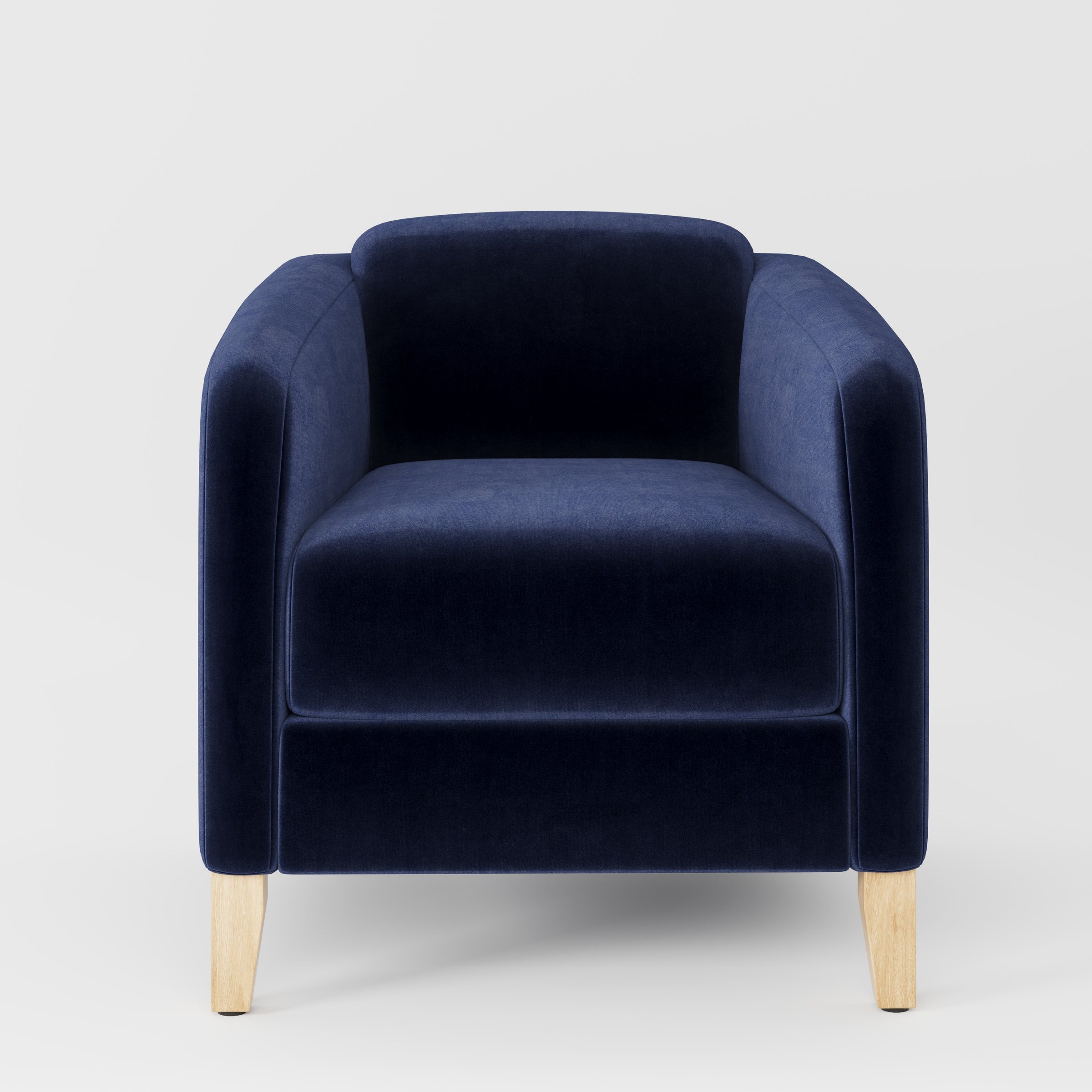 Erne armchair in Noss Velvet Navy shown front-on against a neutral studio backdrop.