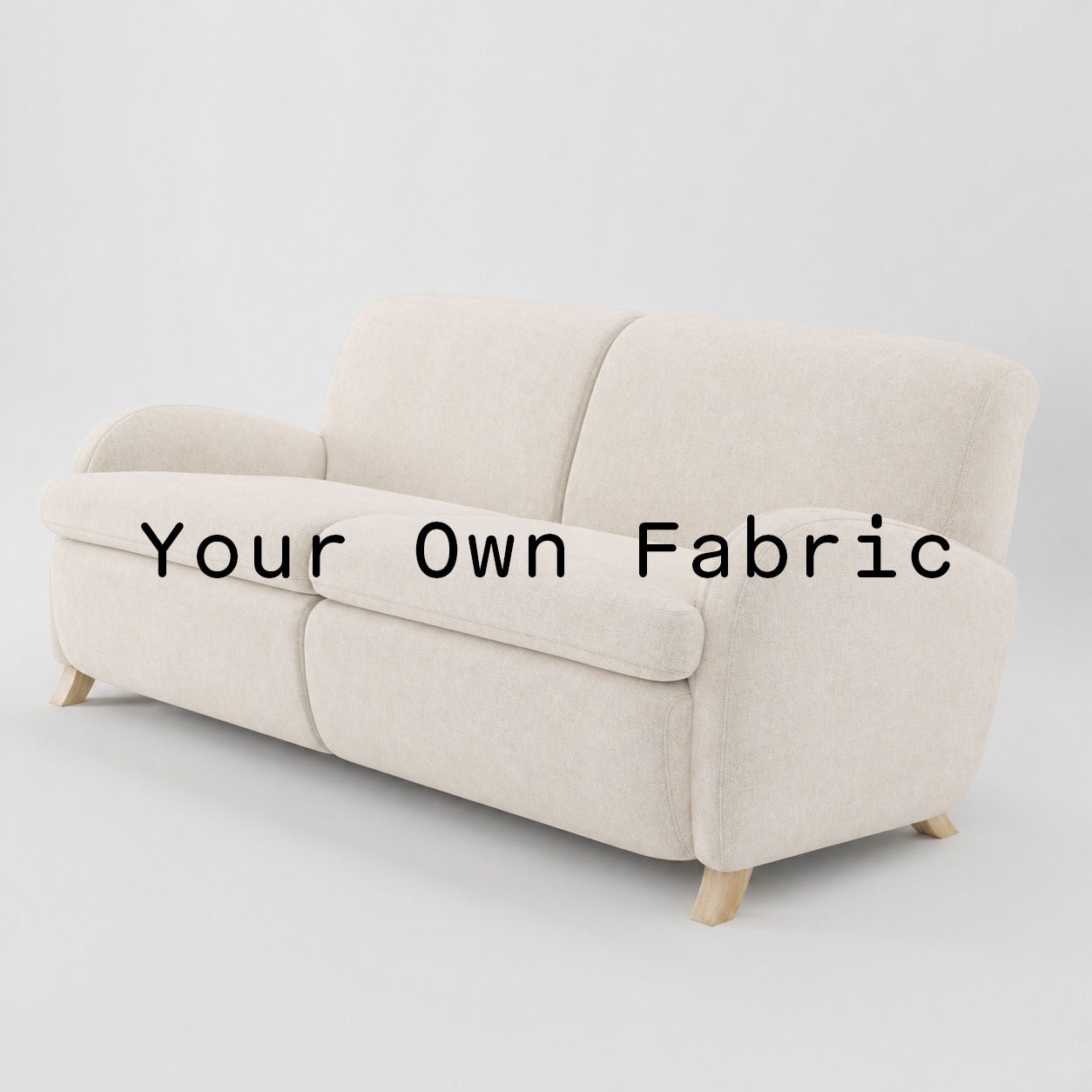 Diagonal view of the Rye sofa upholstered in customers own material calico cotton fabric.