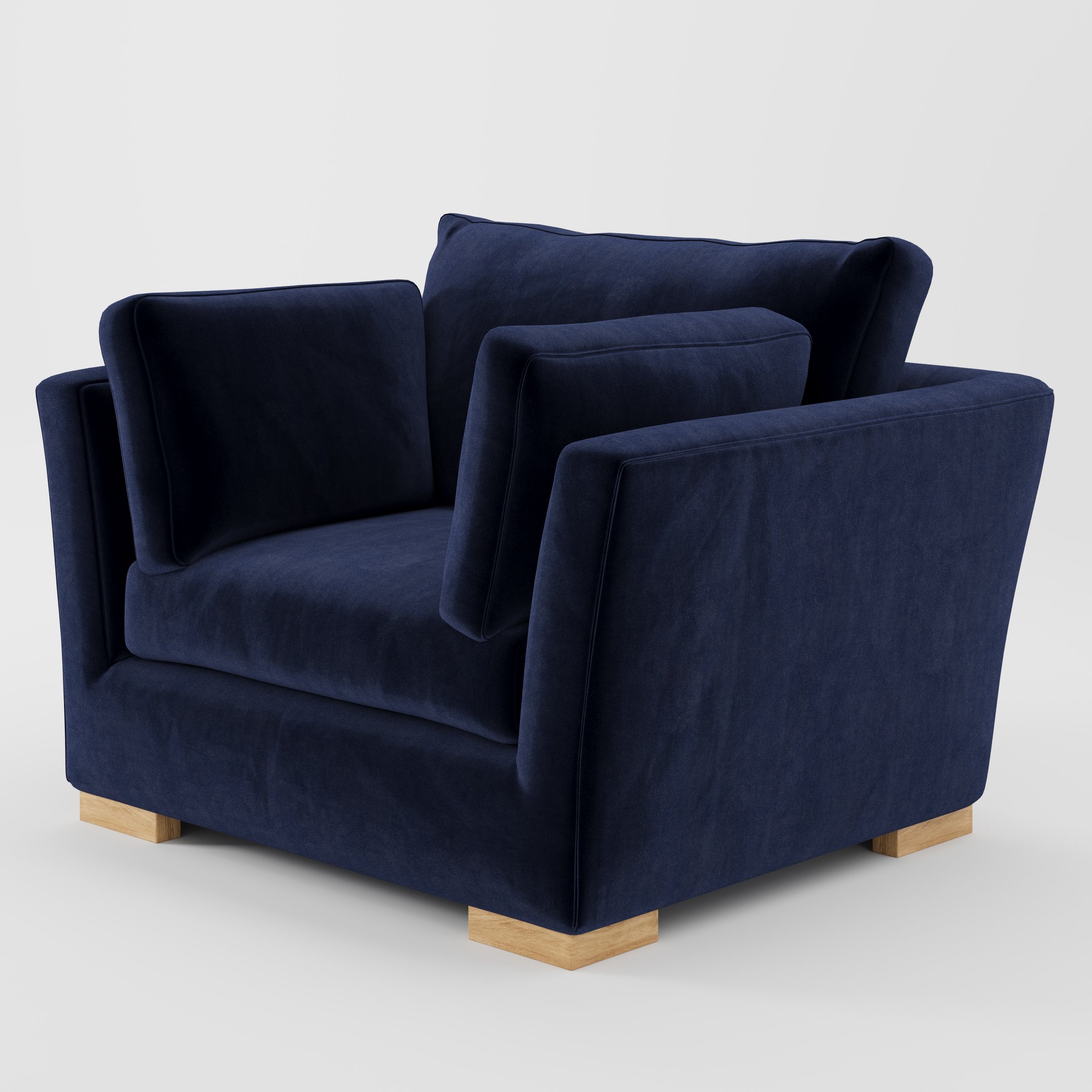 Stowe armchair in Noss Velvet Navy shown at a diagonal angle highlighting splayed arms and seat depth.