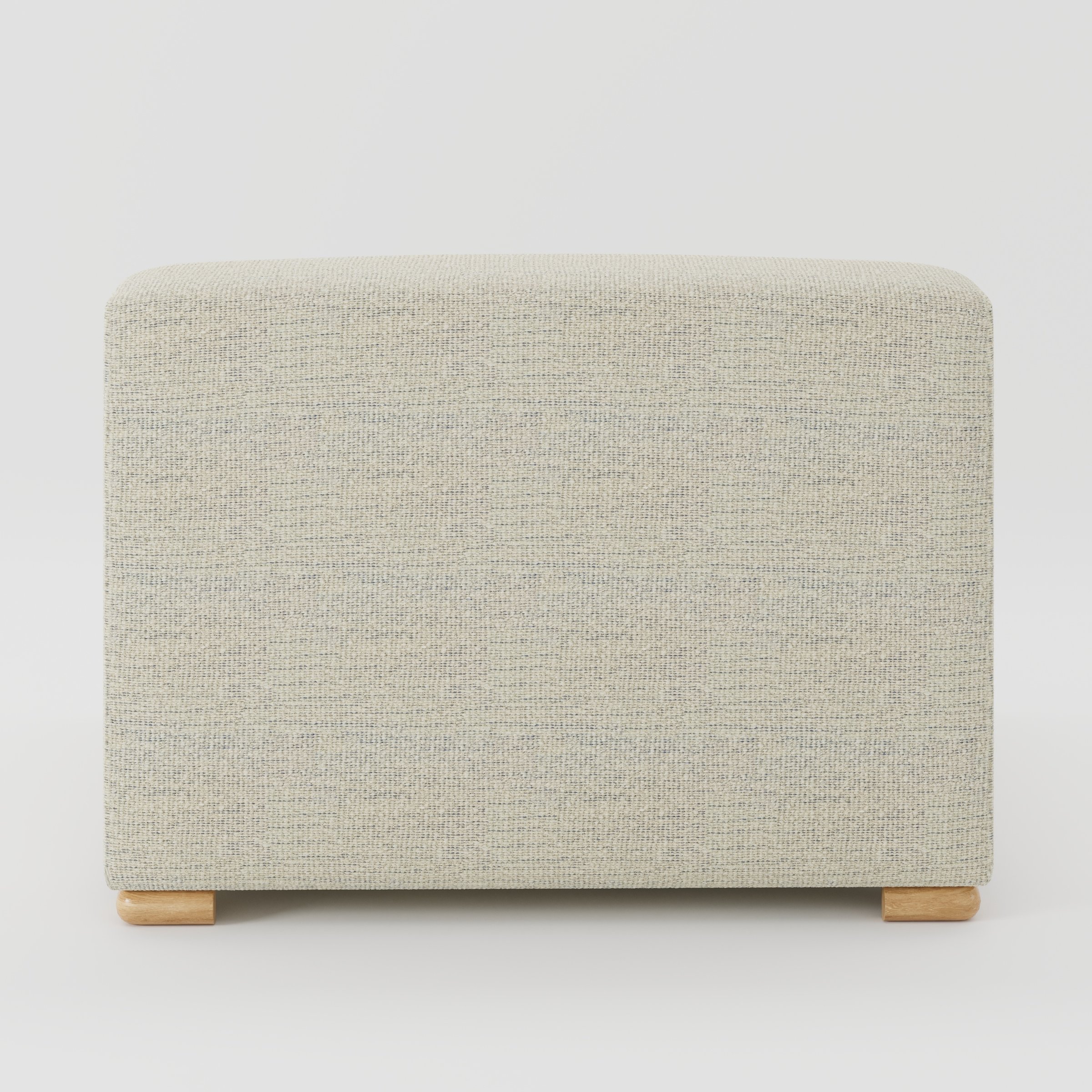 Tay single sofa unit in Orsay Bouclé Cream and Marine shown from the back with a clean, softly curved silhouette and timber feet.
