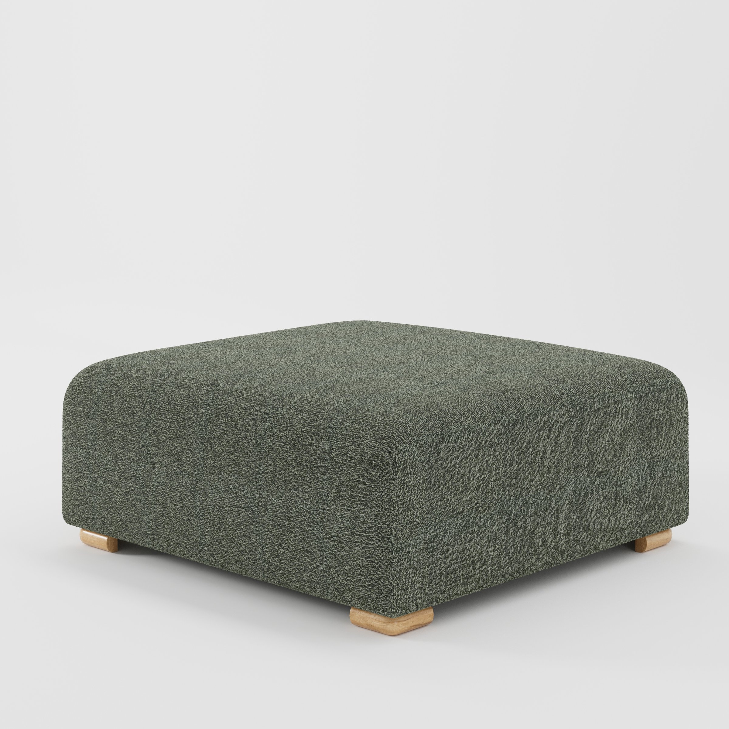 Tay footstool in Kilda Boucle Moss shown at a diagonal angle highlighting clean edges and compact form.
