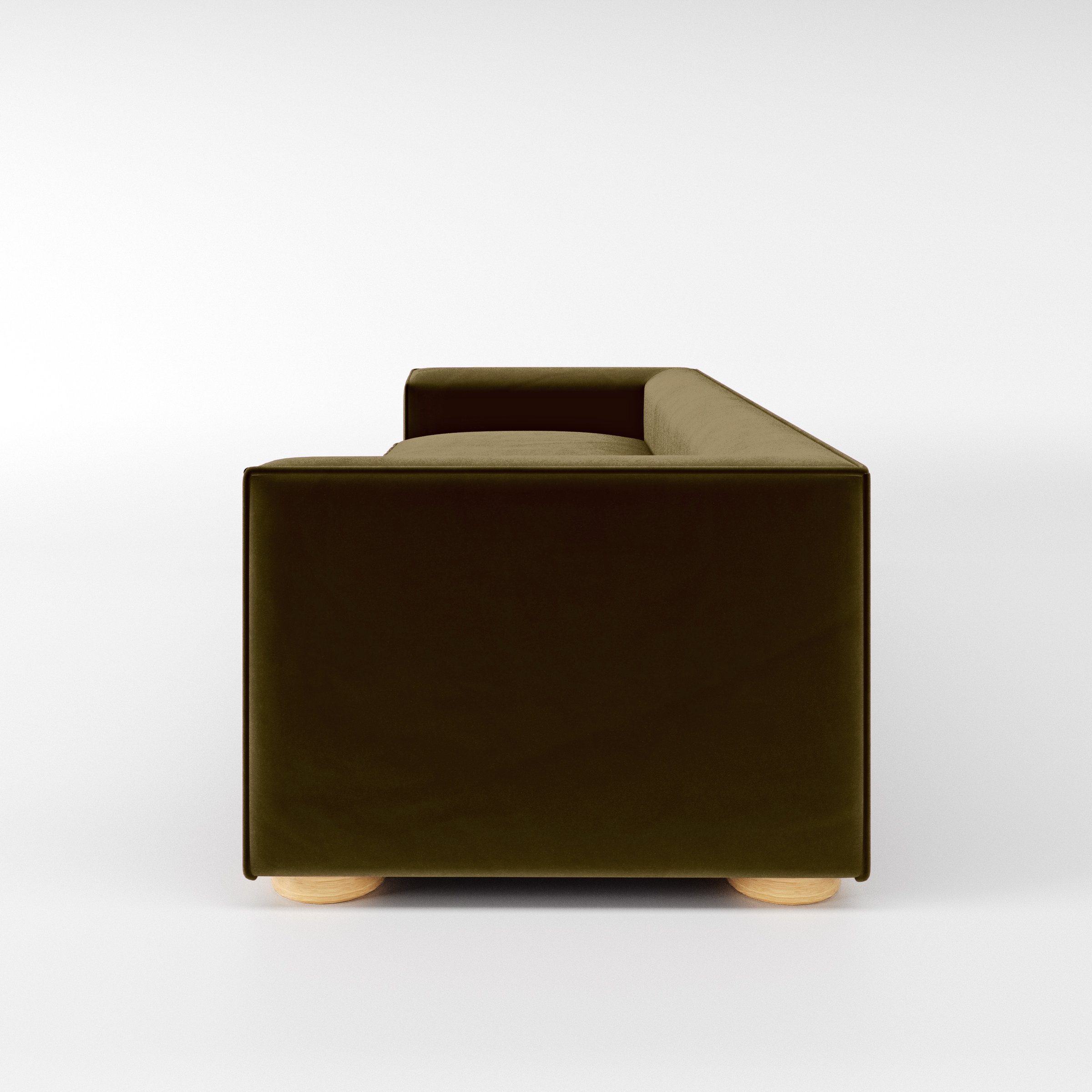 Side view of the Feale sofa upholstered in Plush EasyClean Velvet in Cedar.