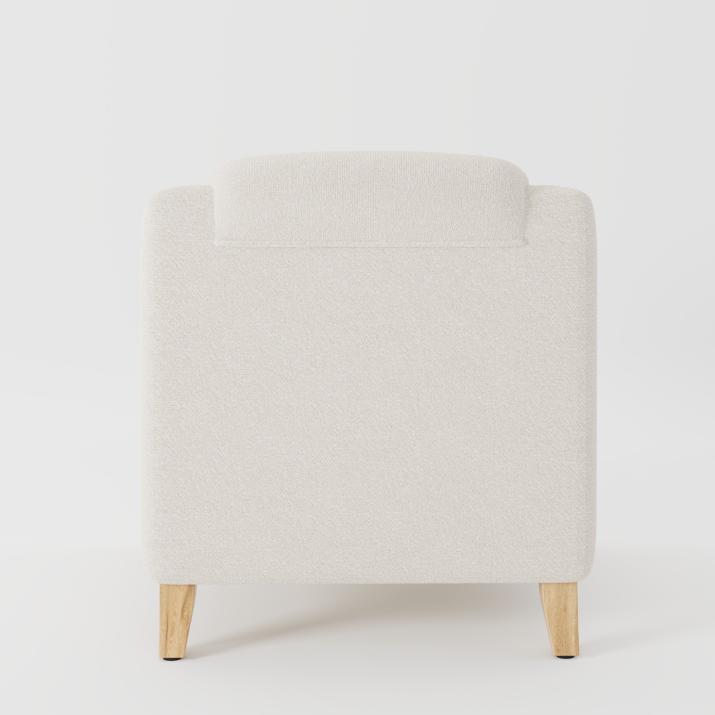 Erne armchair in Kilda Boucle Cream shown from the rear highlighting backrest shape and upholstery finish.
