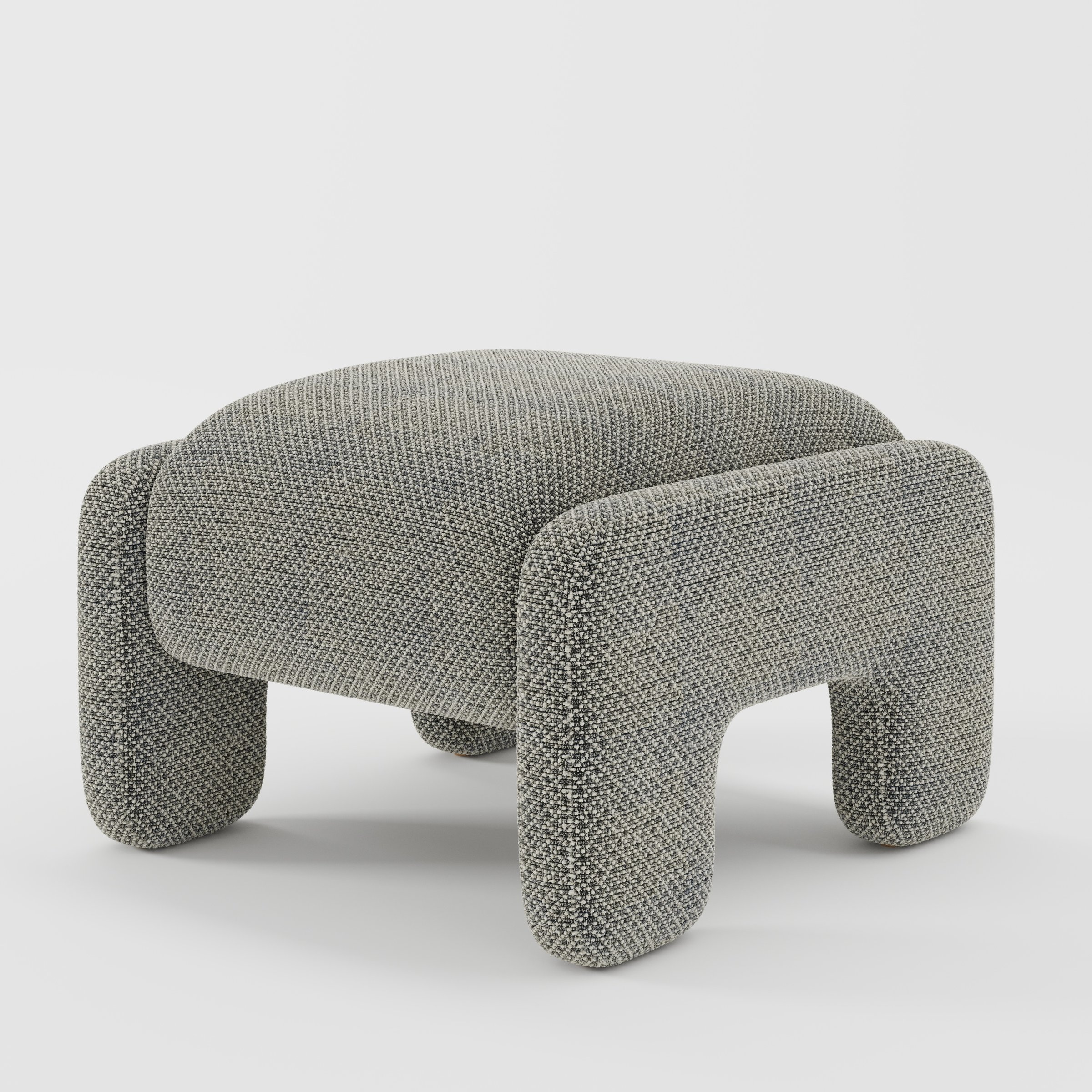 Inny footstool in Rousay wool blend tar and chalk fabric, diagonal view highlighting structured silhouette and subtle contrast weave
