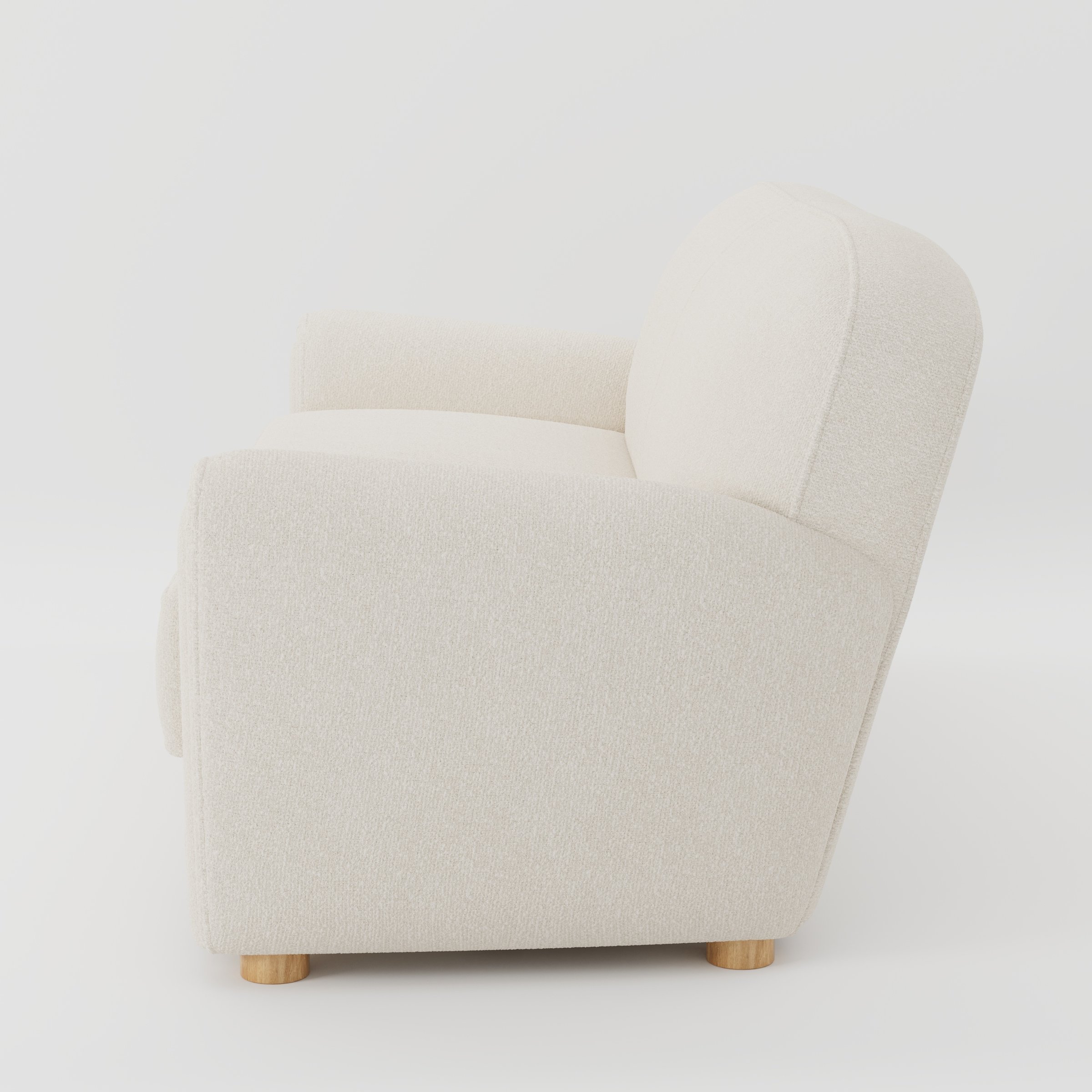 Fergus sofa in Kilda Boucle Cream shown in side profile displaying proportions and overall silhouette.