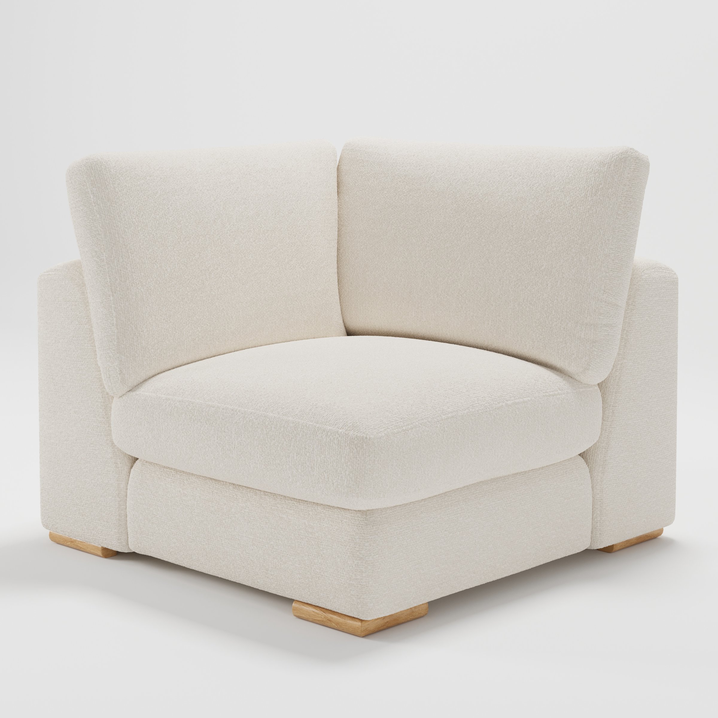 Olton corner unit in Kilda bouclé cream fabric, diagonal view highlighting soft curves and textured finish