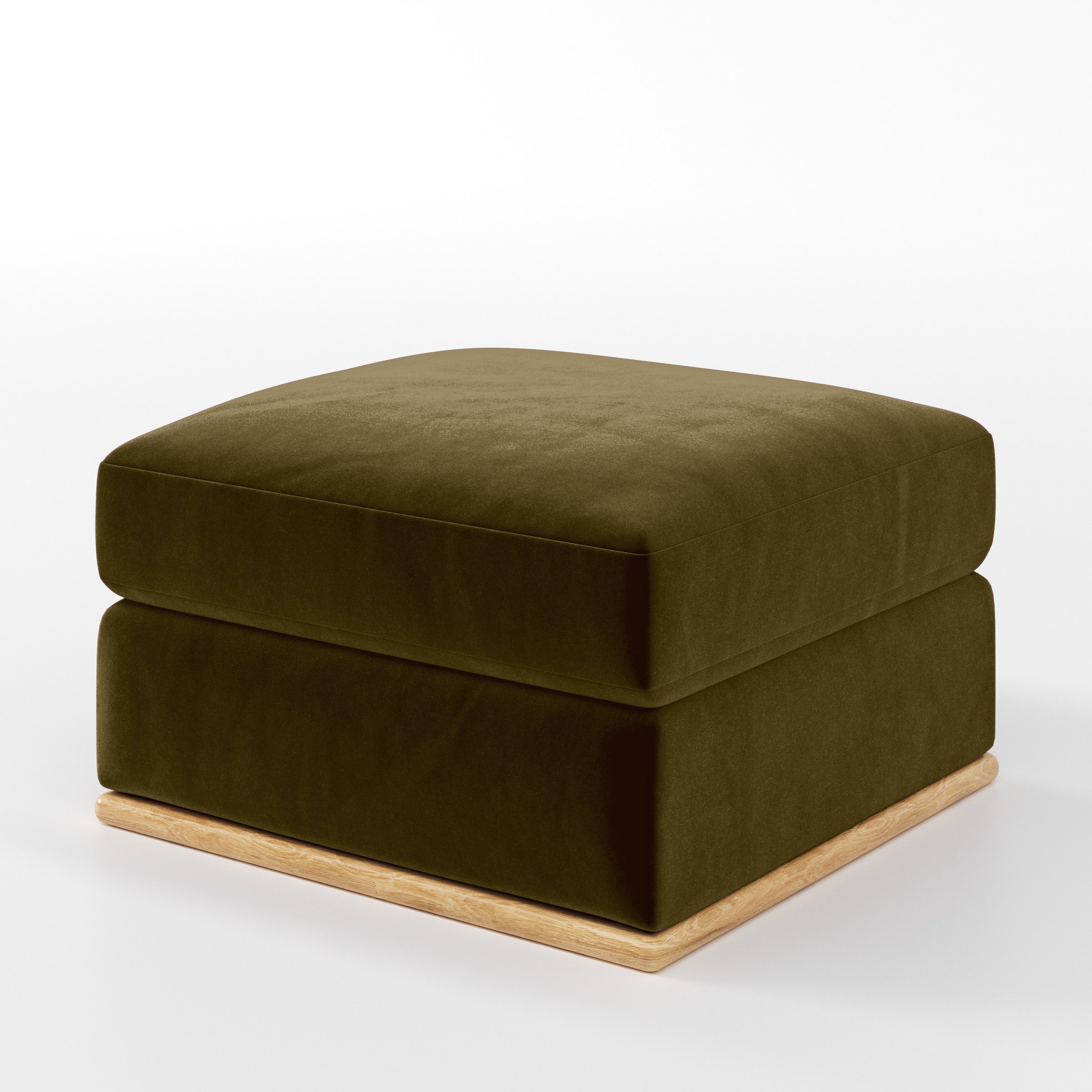 Diagonal view of the Cusher footstool upholstered in Plush EasyClean Velvet in Cedar.