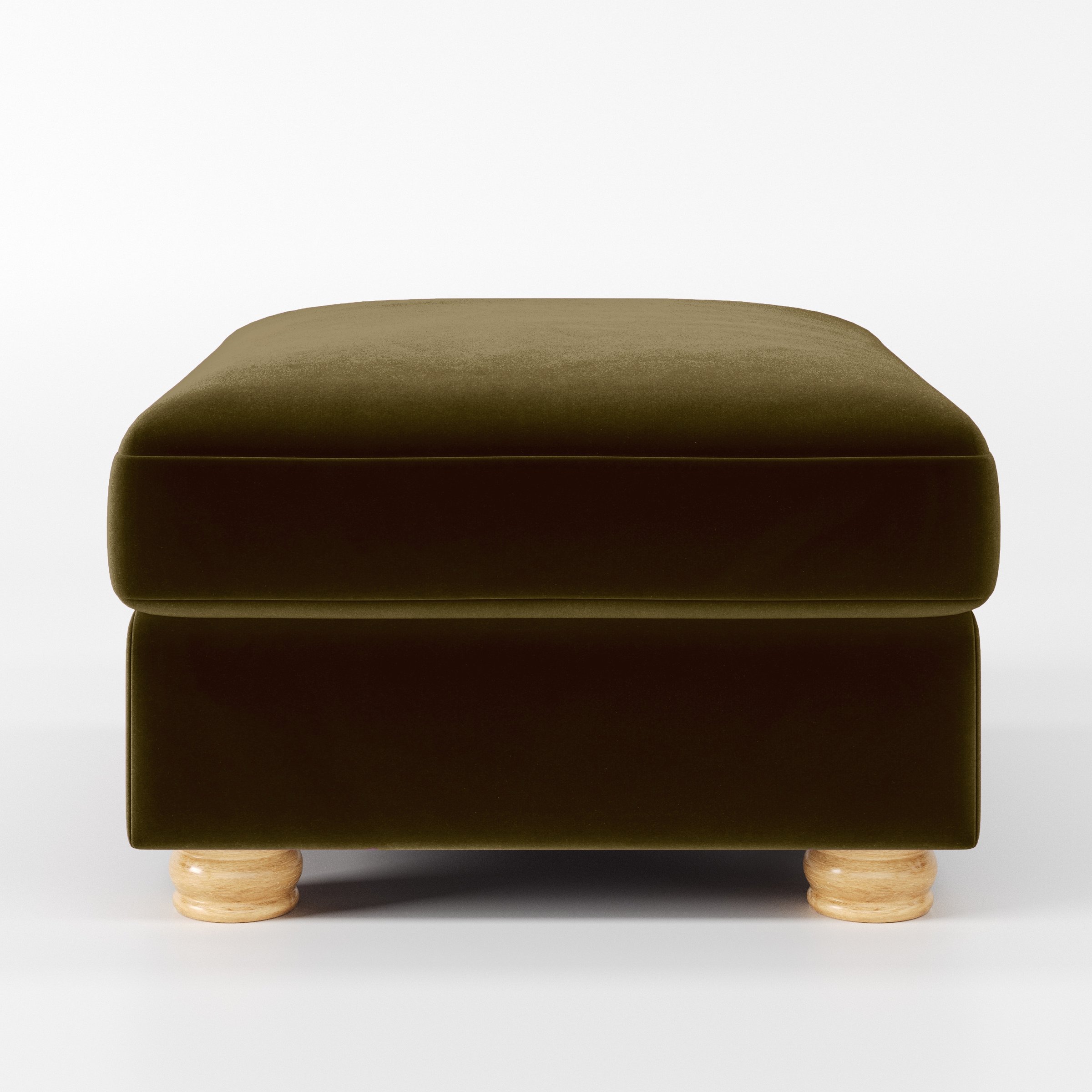 Front view of the Anna Lee footstool upholstered in Plush EasyClean Velvet in Cedar.