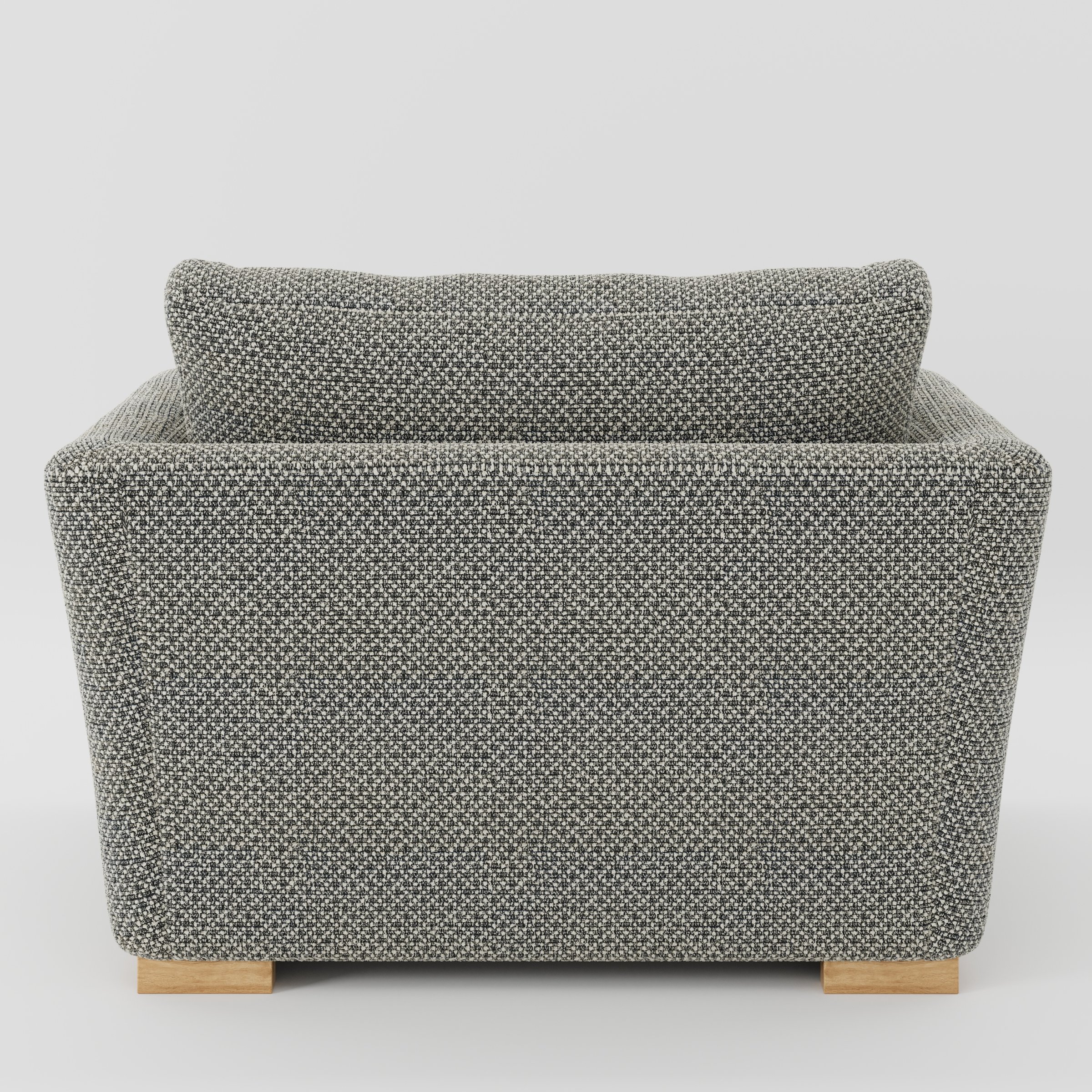 Stowe armchair in Rousay Wool Blend Tar and Chalk shown from the rear highlighting backrest shape and upholstery finish.