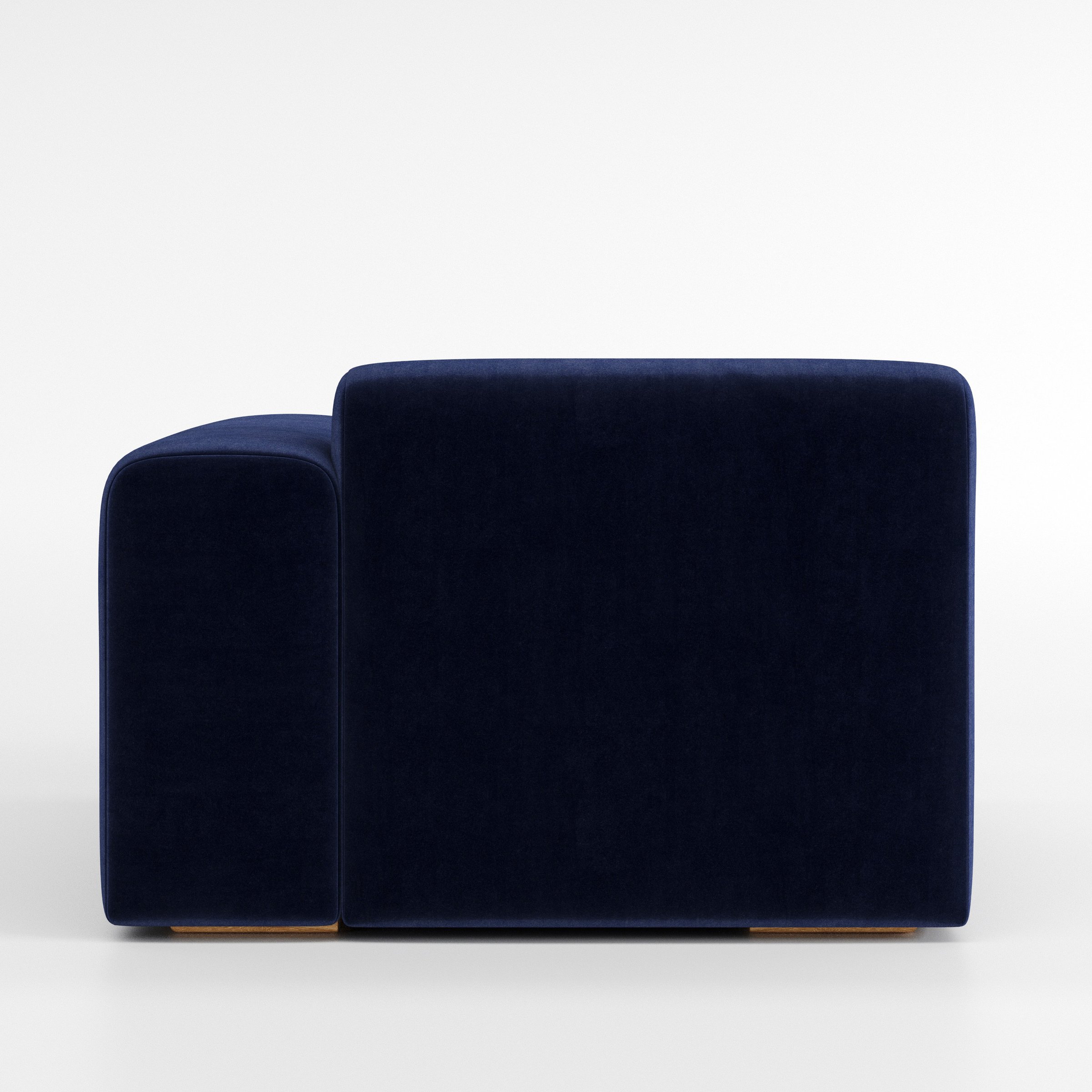 Drumquin modular sofa right side unit in Noss Velvet Navy shown from the back with a smooth, softly curved silhouette and armrest edge visible.