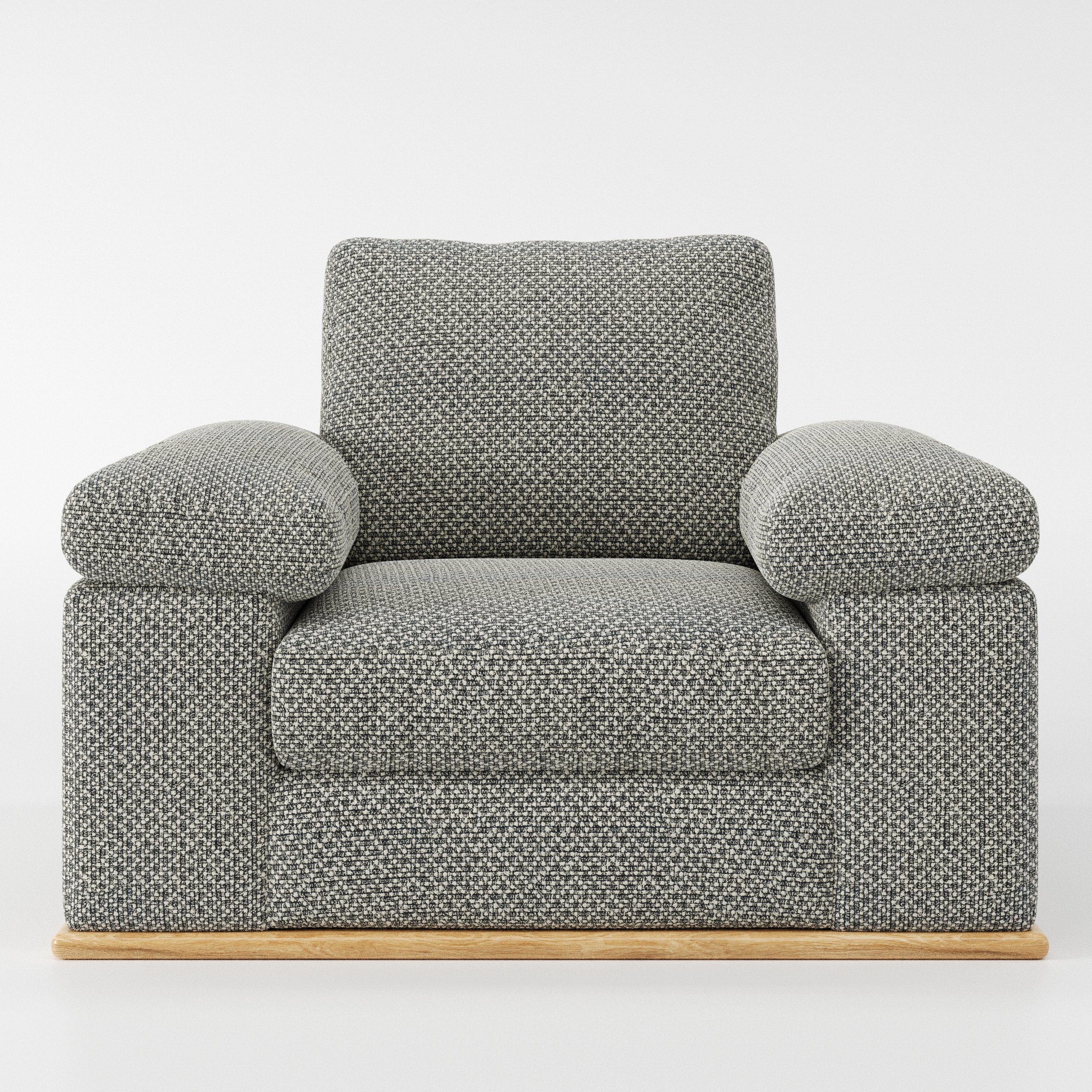 Cusher armchair in Rousay Wool Blend Tar and Chalk shown front-on against a neutral studio backdrop.