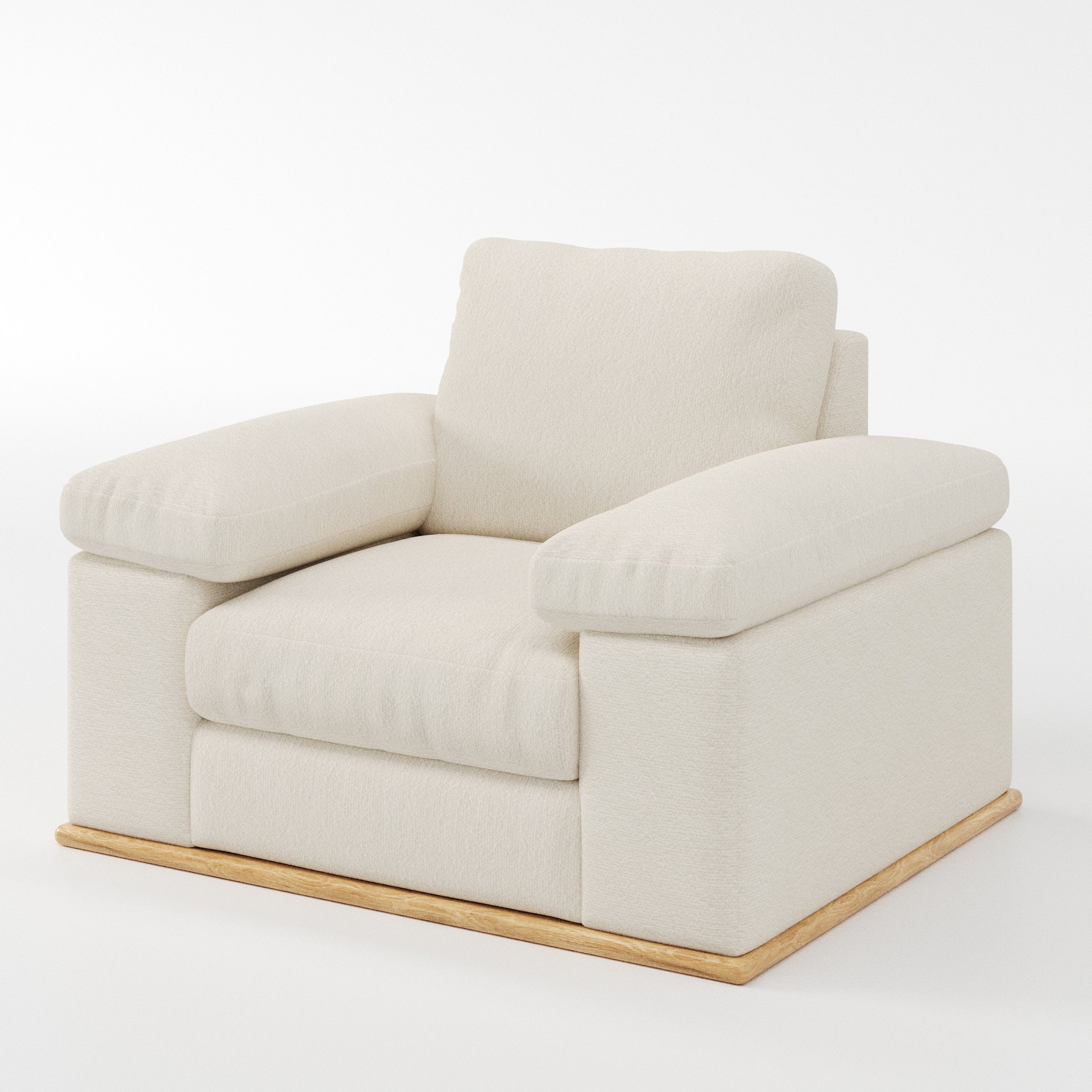 Cusher armchair in Kilda Boucle Cream shown at a diagonal angle highlighting arms and seat depth.