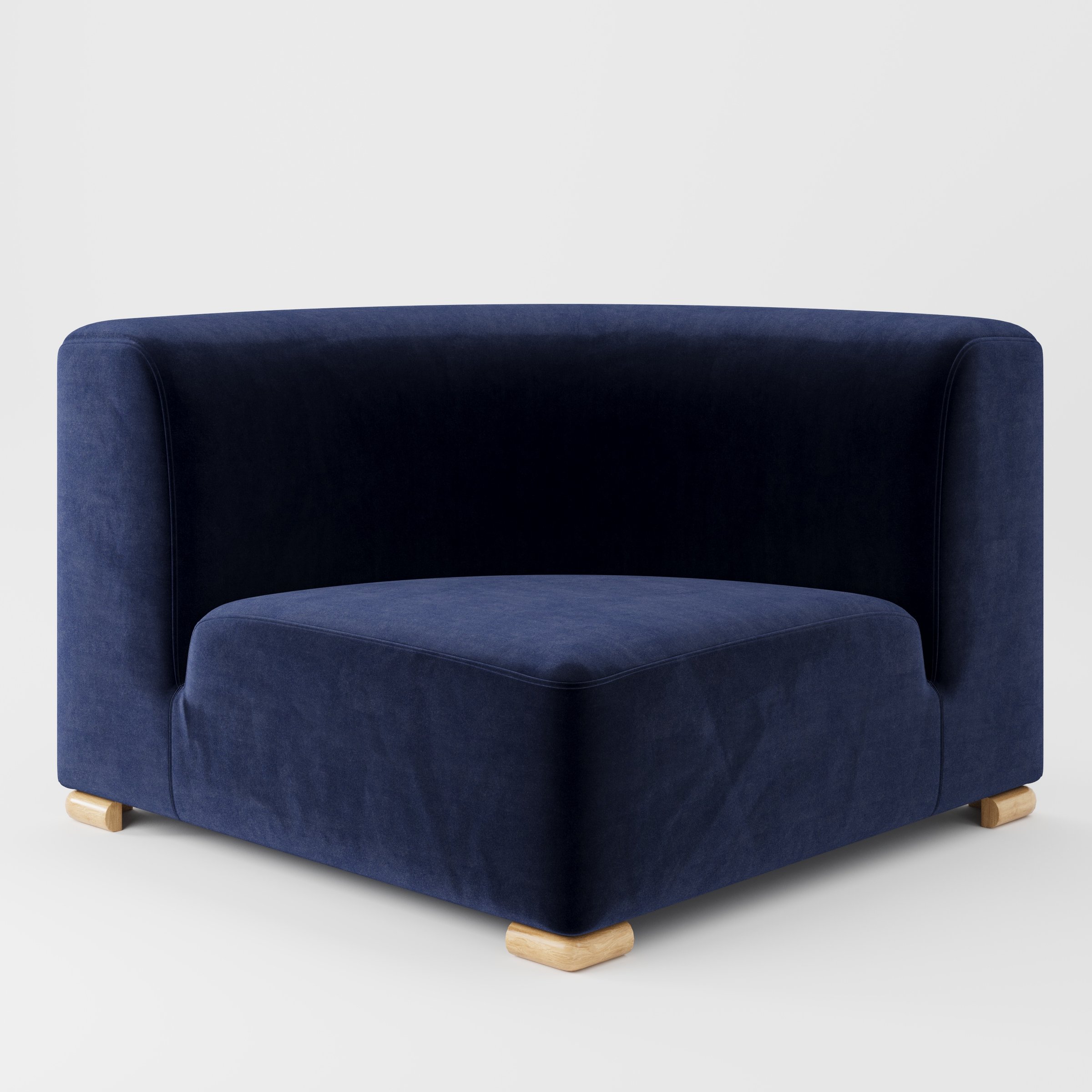 Tay corner sofa unit in Noss Velvet Navy shown from the front with a curved corner seat, wraparound backrest and visible timber feet.