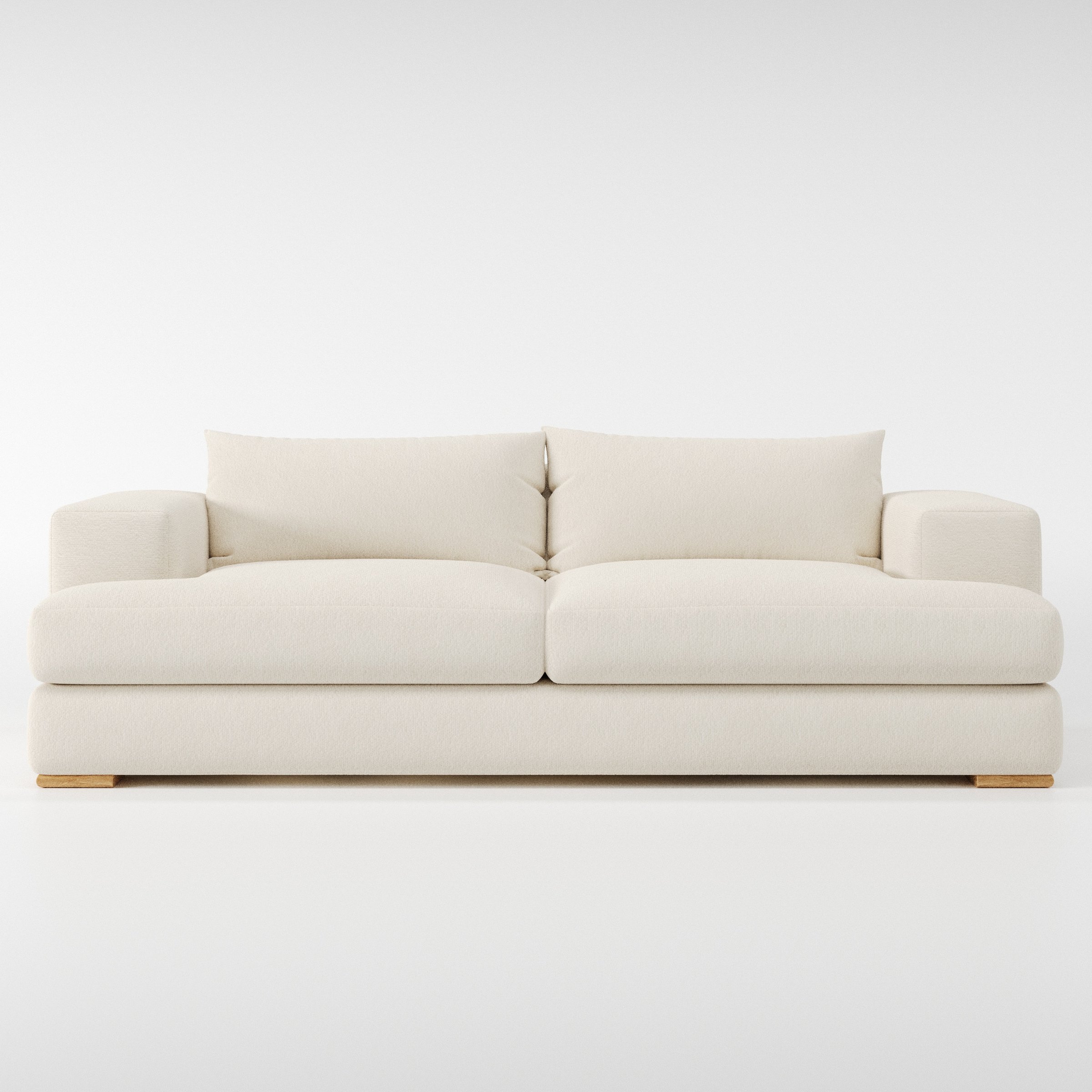 Fane sofa in Kilda Boucle Cream shown front-on against a neutral studio backdrop.