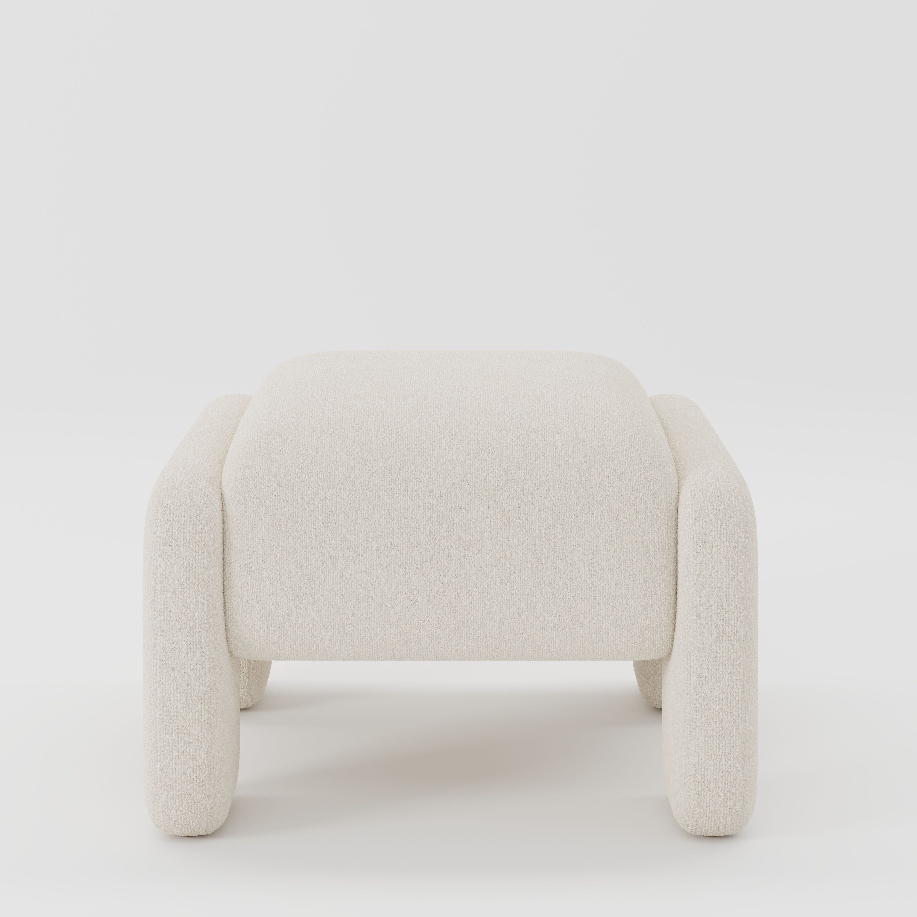 Inny footstool in Kilda bouclé cream fabric, front view showing soft rounded form and textured finish