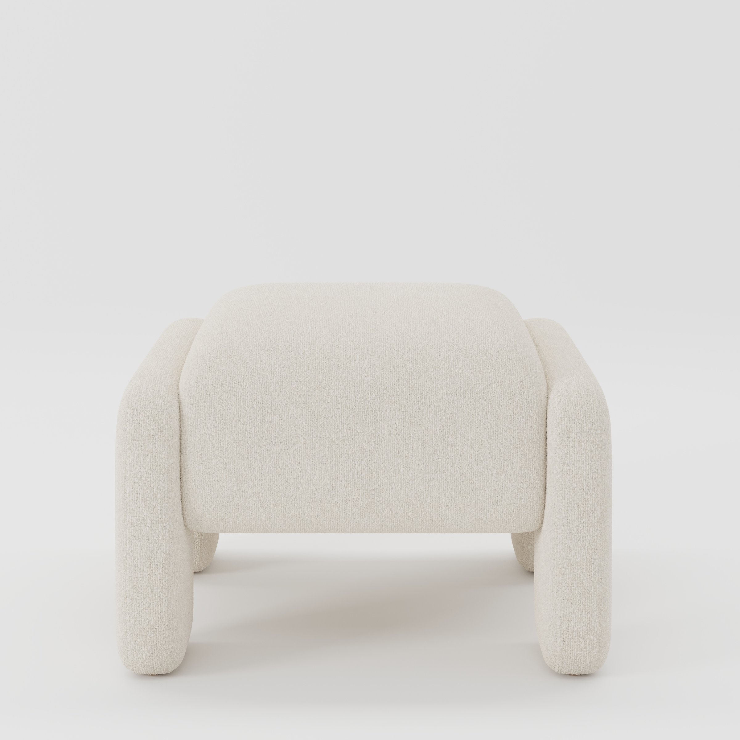 Inny footstool in Kilda bouclé cream fabric, front view showing soft rounded form and textured finish