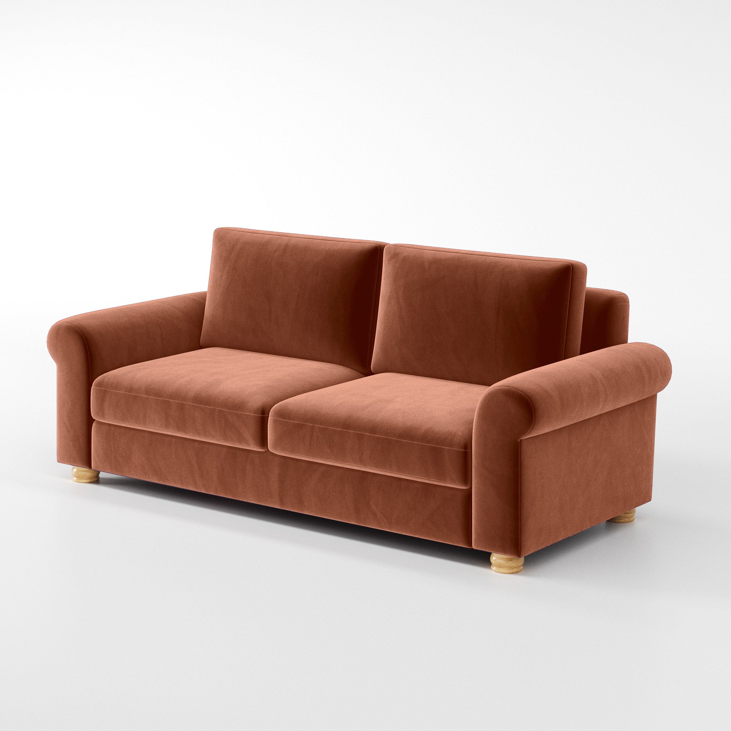 Diagonal view of the Anna Lee sofa upholstered in Plush EasyClean Velvet in Apricot.