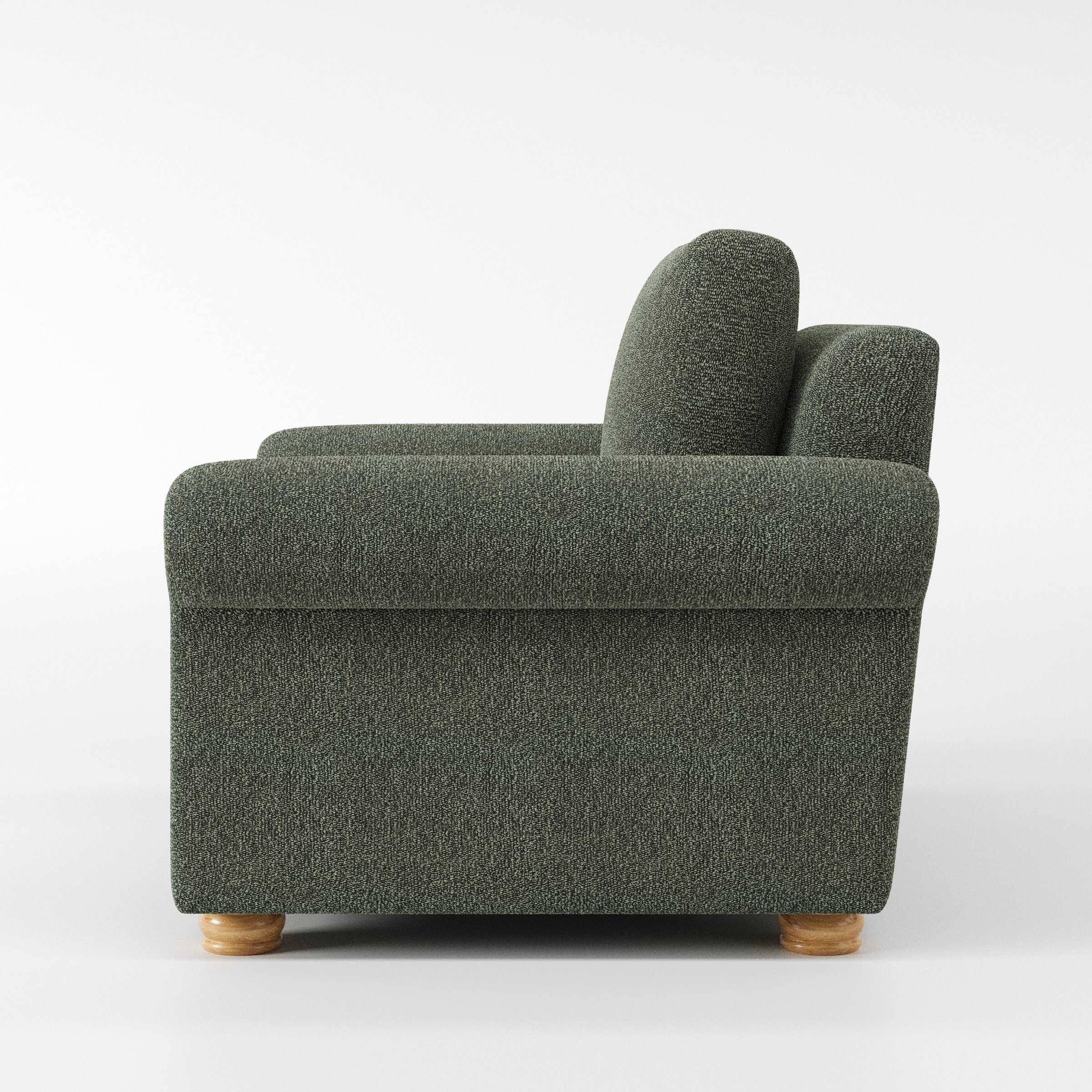 Anna Lee armchair in Kilda Boucle Moss shown in side profile displaying proportions and overall silhouette.