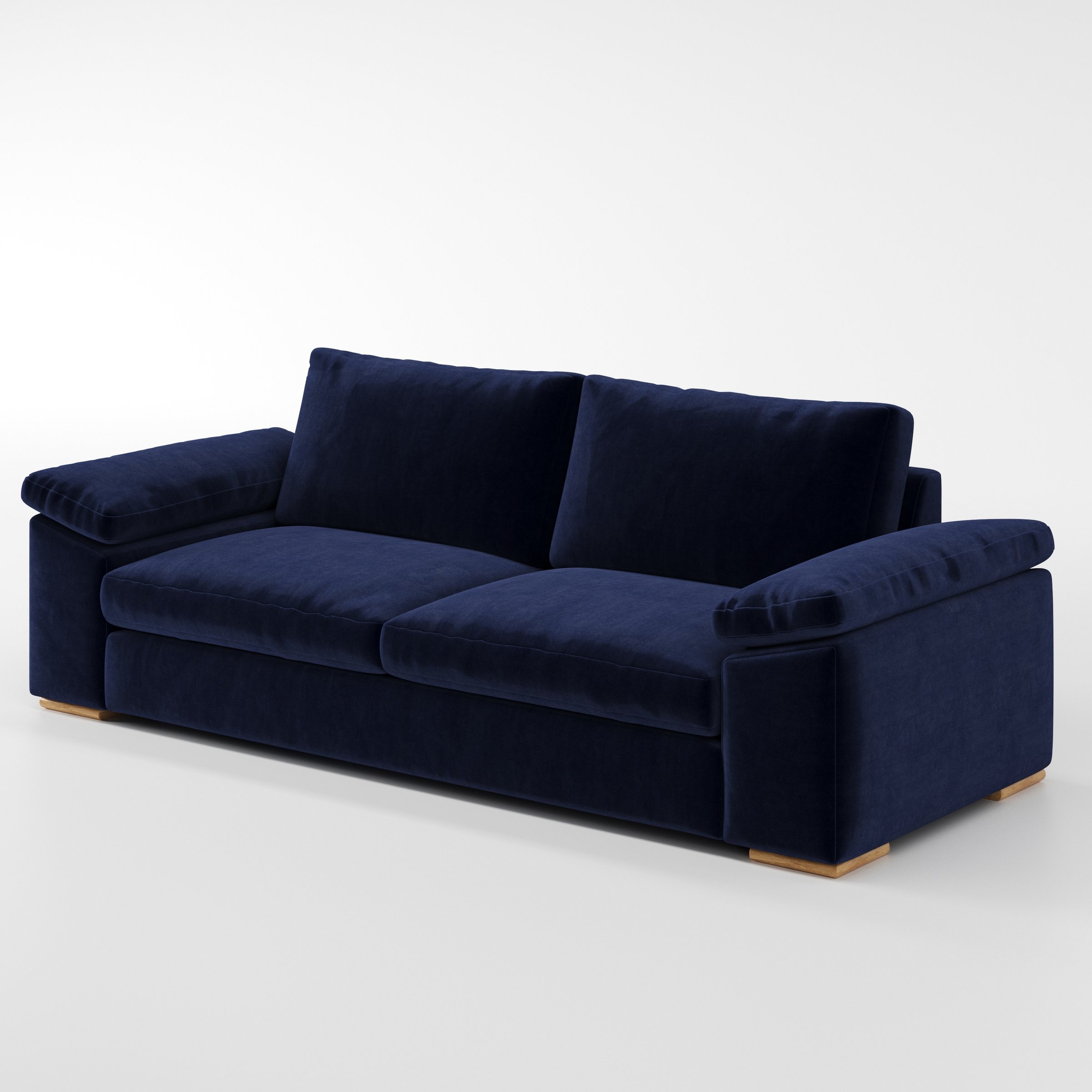Moy sofa in Noss Velvet Navy shown at a diagonal angle highlighting arm profile and seat depth.