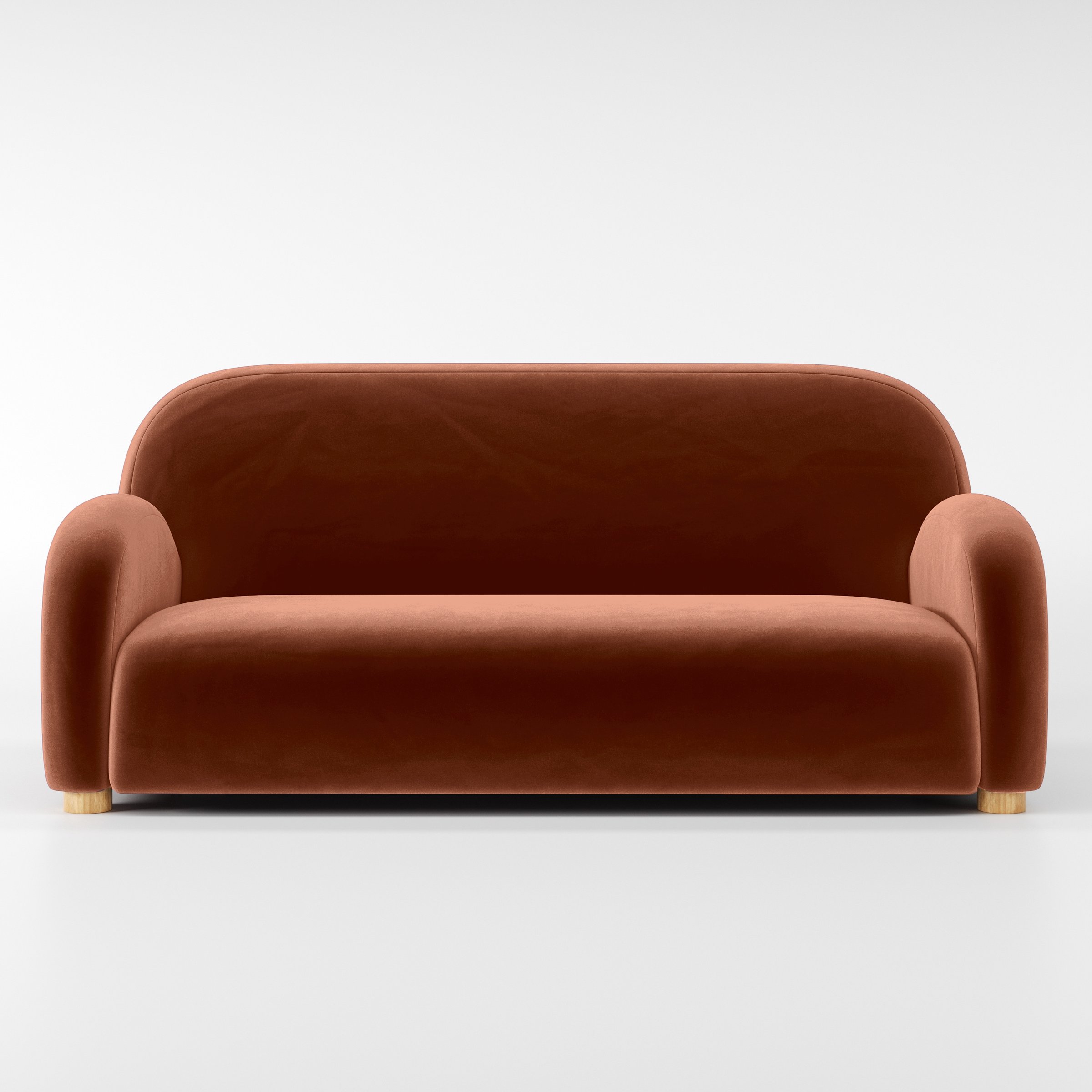 Front view of the Awe sofa upholstered in Plush EasyClean Velvet in Apricot.
