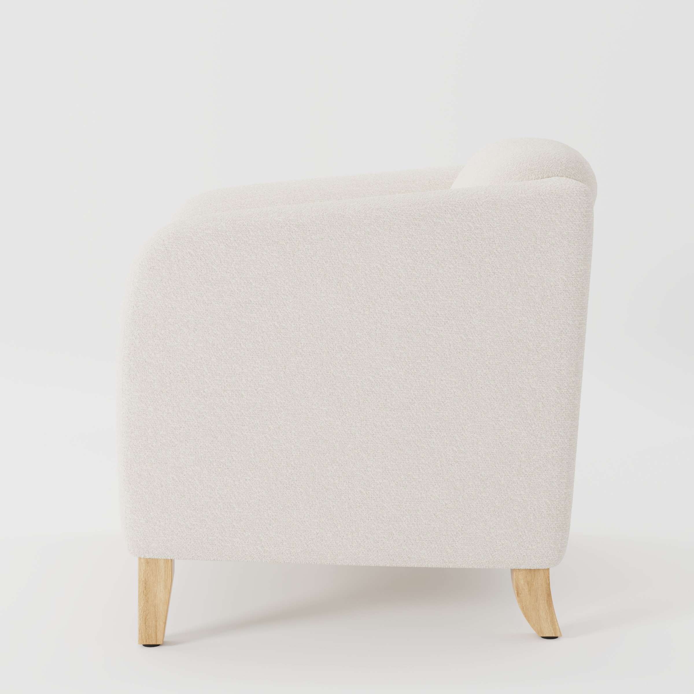 Erne armchair in Kilda Boucle Cream shown in side profile displaying proportions and overall silhouette.