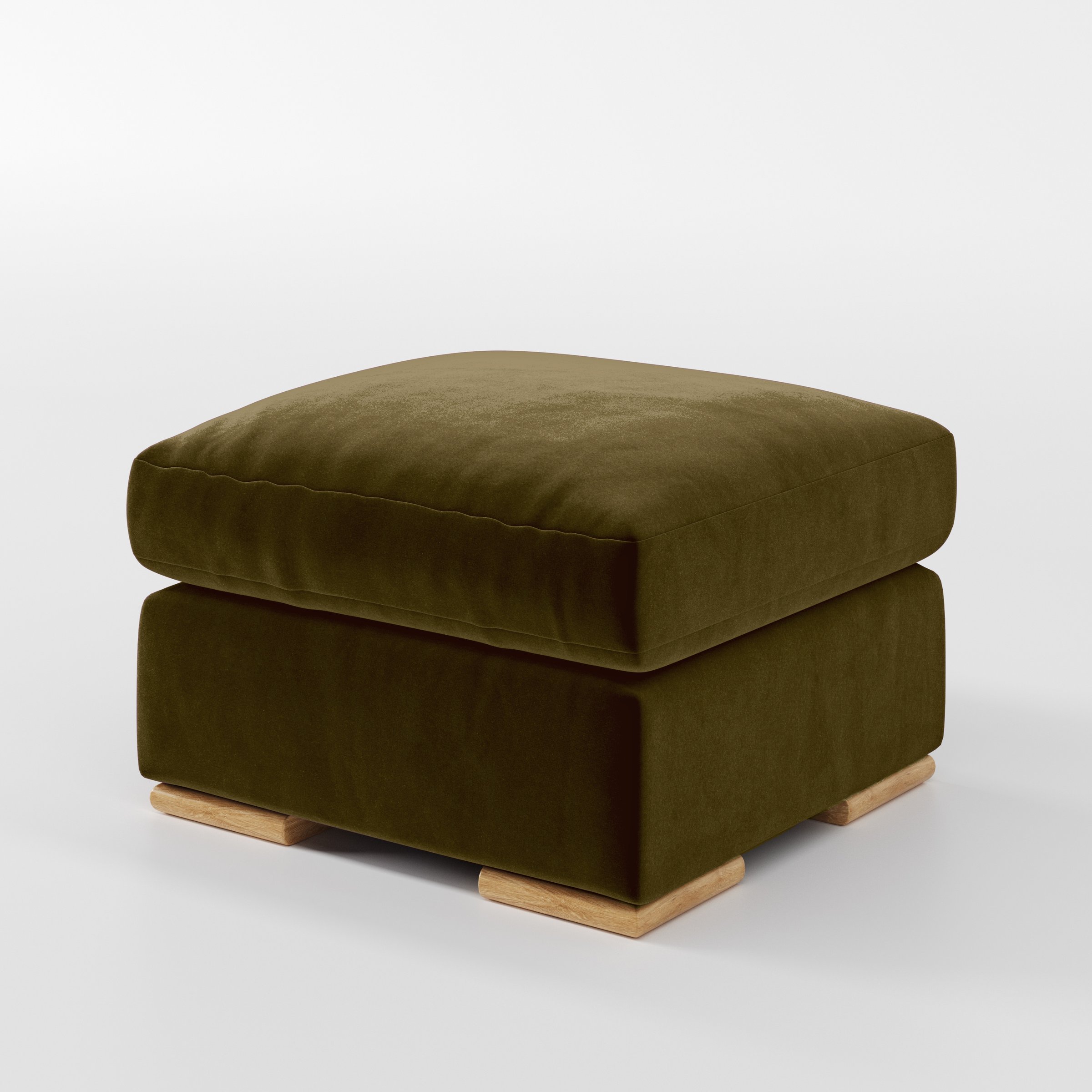 Diagonal view of the Fane footstool upholstered in Plush EasyClean Velvet in Cedar.