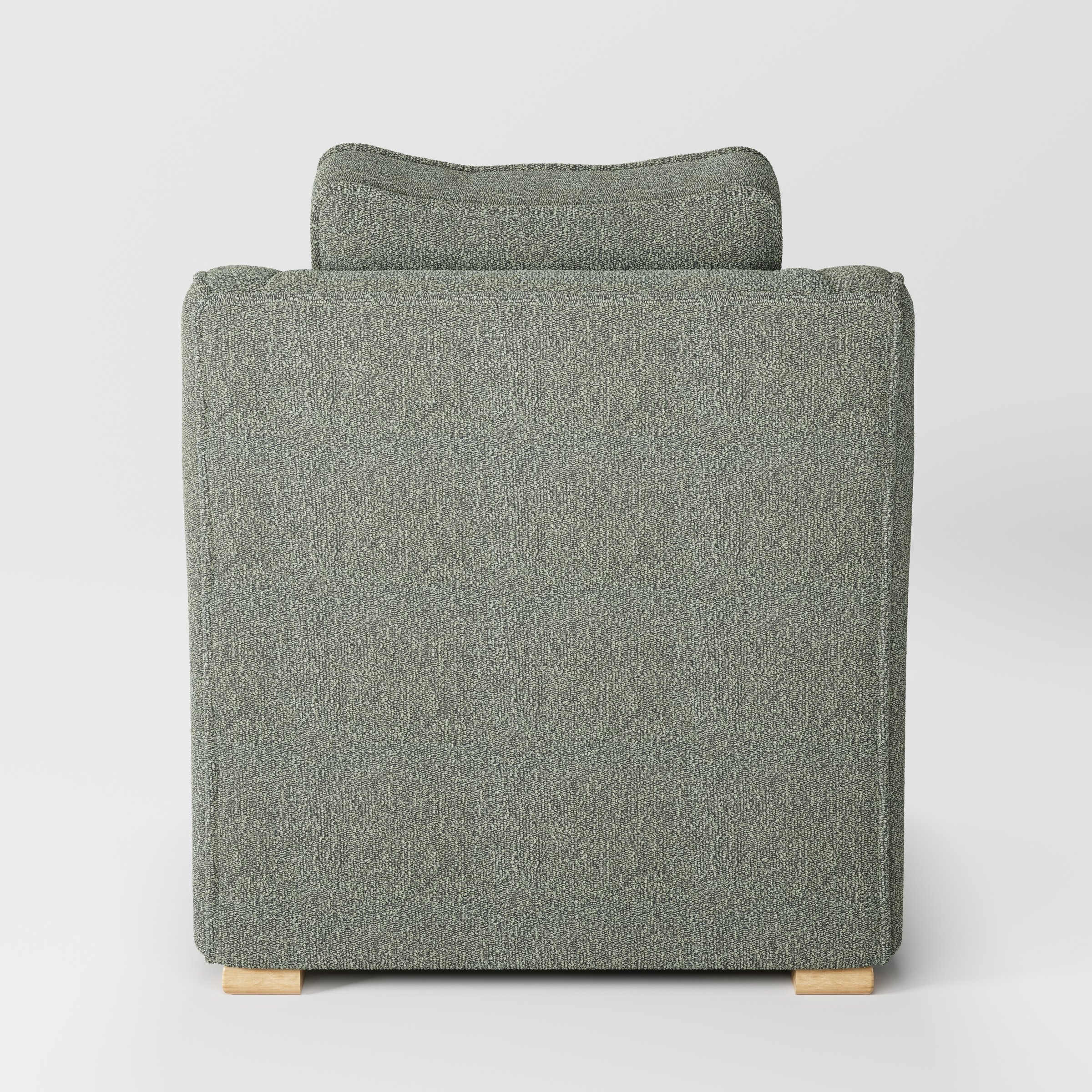 Cashel armchair in Kilda Boucle Moss shown from the rear highlighting backrest shape and upholstery finish.