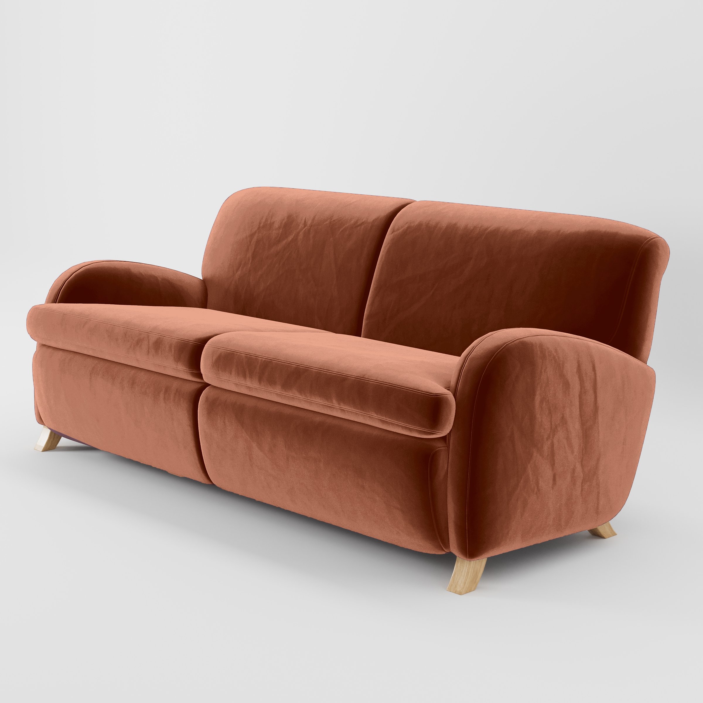 Diagonal view of the Rye sofa upholstered in Plush EasyClean Velvet in Apricot.