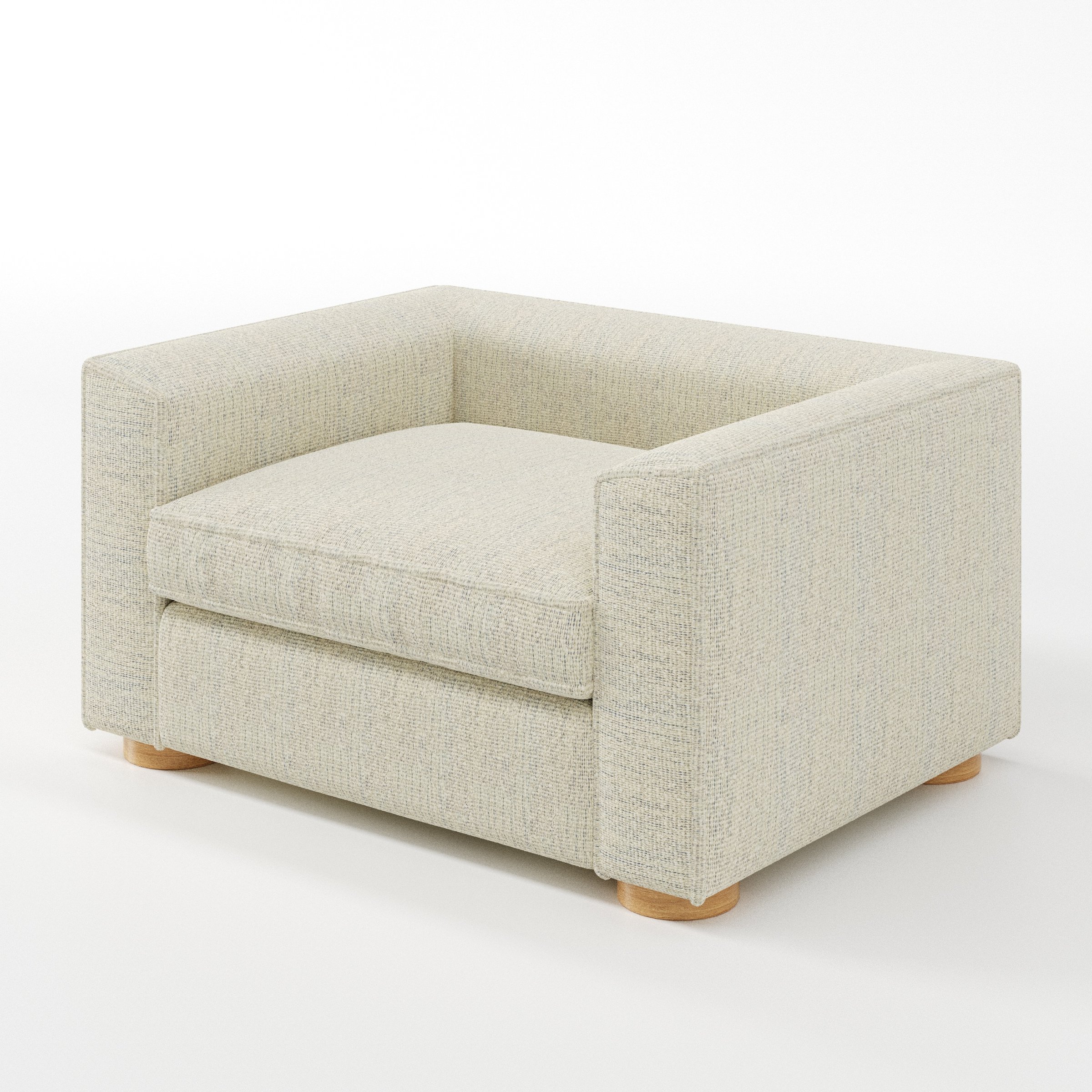 Feale armchair in Orsay Boucle Cream and Marine shown at a diagonal angle highlighting arms and seat depth.