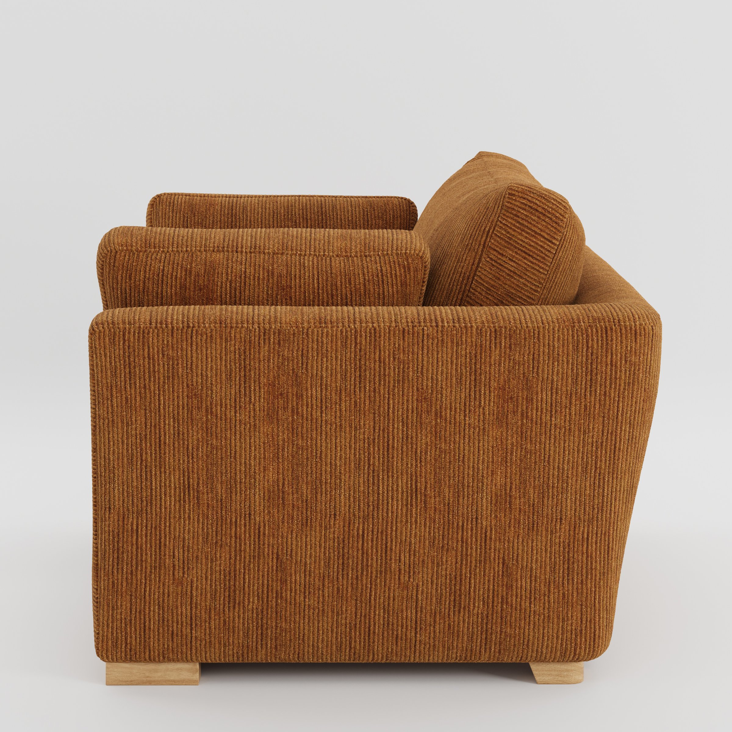 Stowe armchair in Caldey Velvet Corduroy Tobacco shown in side profile displaying proportions and overall silhouette.