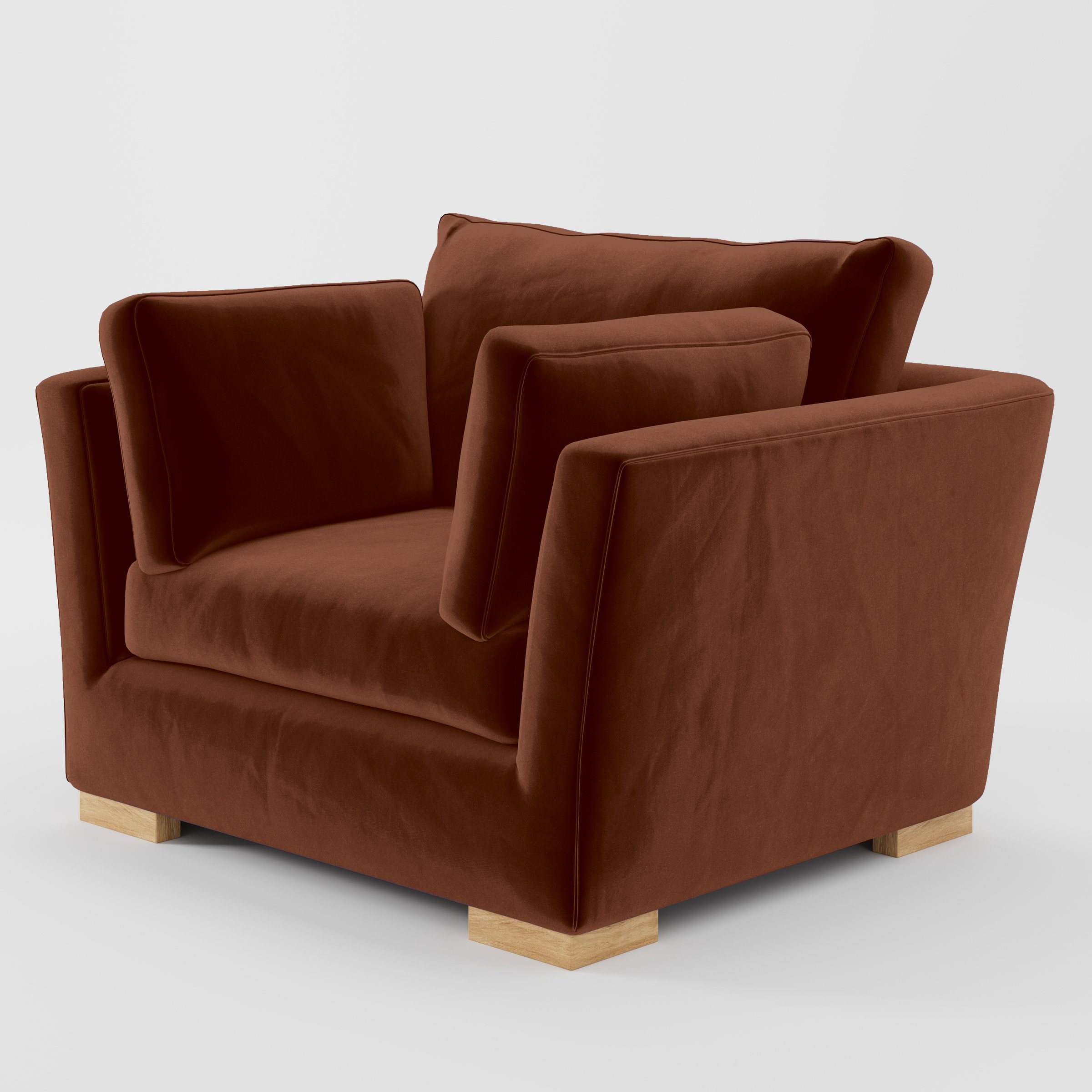 Diagonal view of the Stowe armchair upholstered in Plush EasyClean Velvet in Maple.