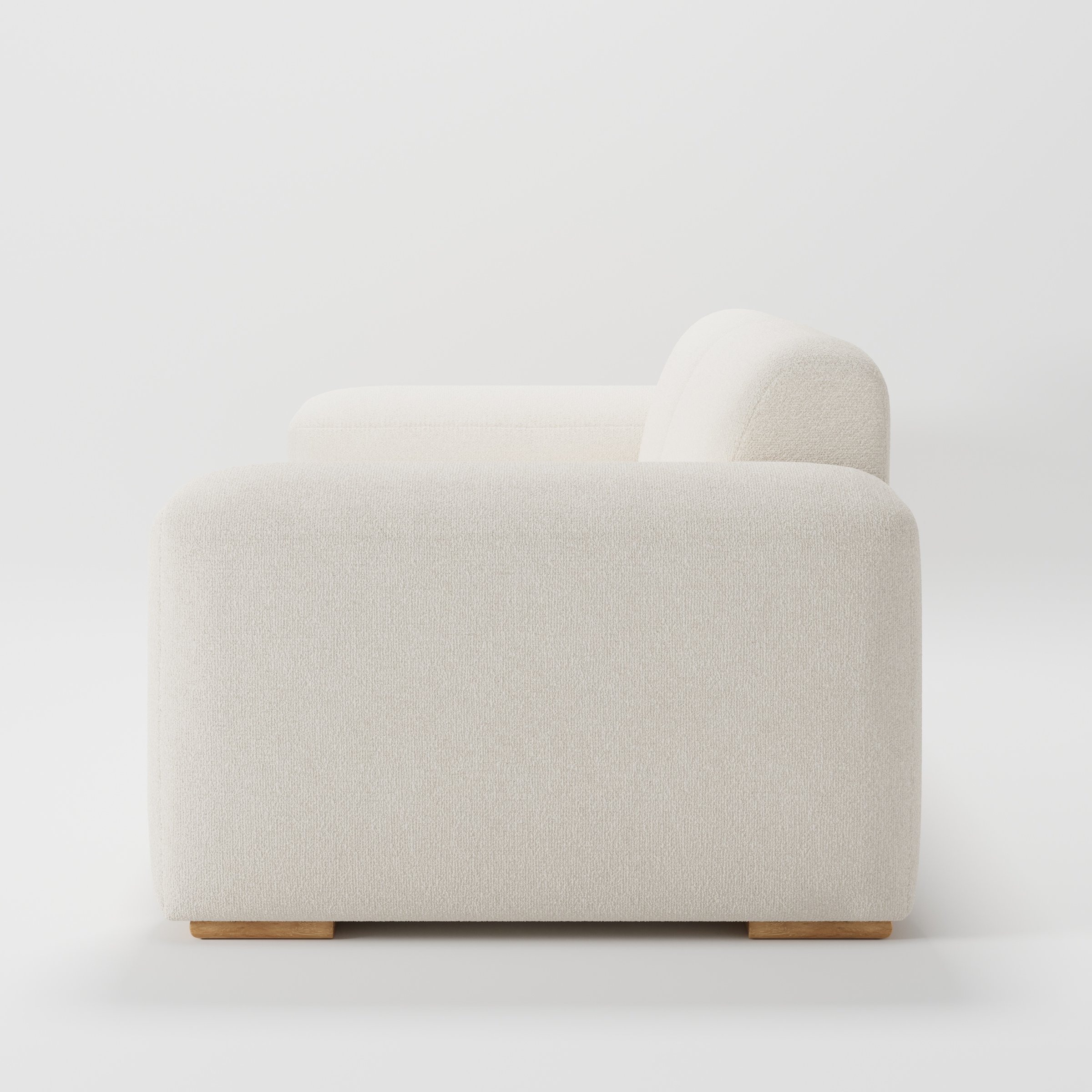 Darwell sofa in Kilda Boucle Cream shown in side profile displaying proportions and overall silhouette.