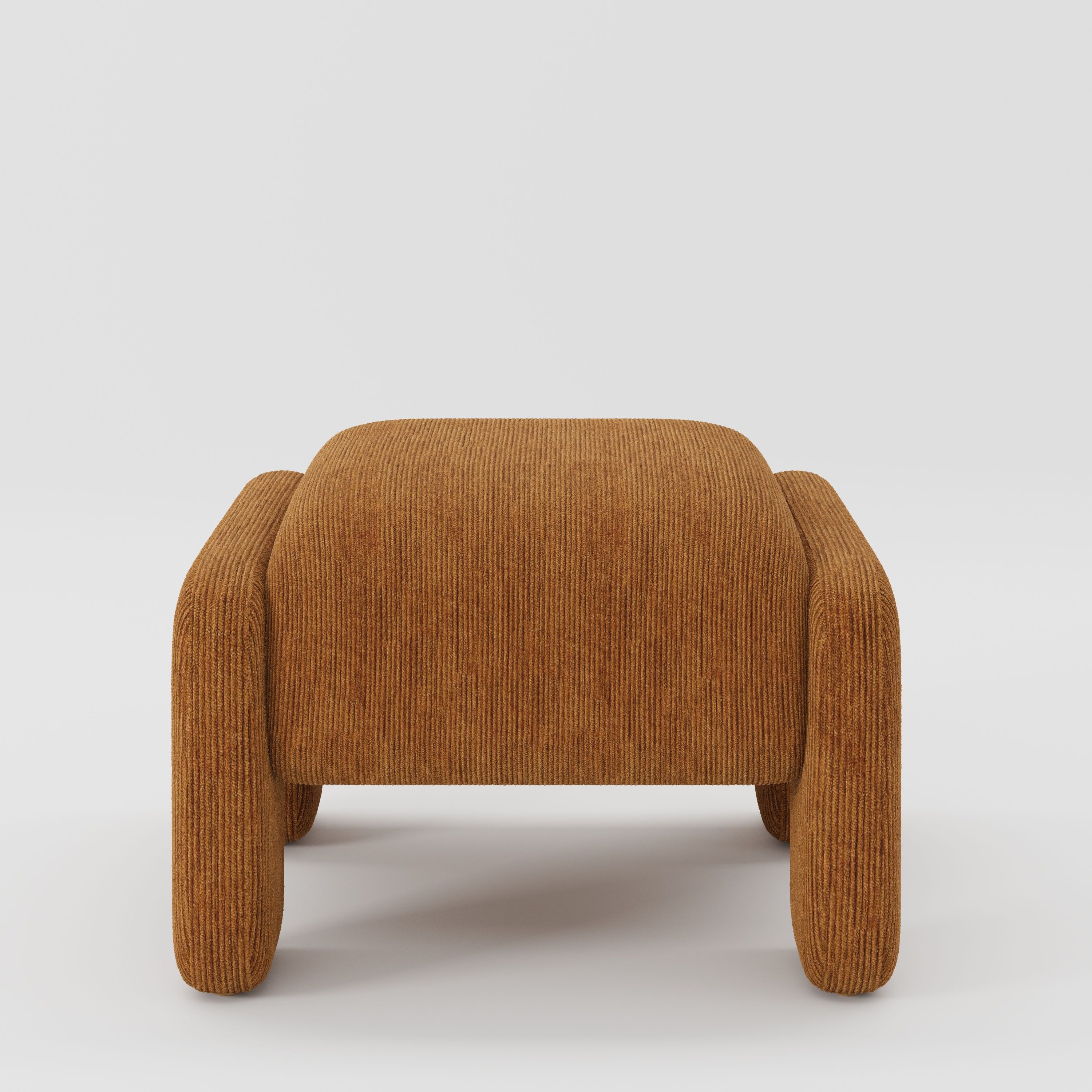 Inny footstool in Caldey velvet corduroy tobacco fabric, front view showing rounded upholstered form and ribbed texture