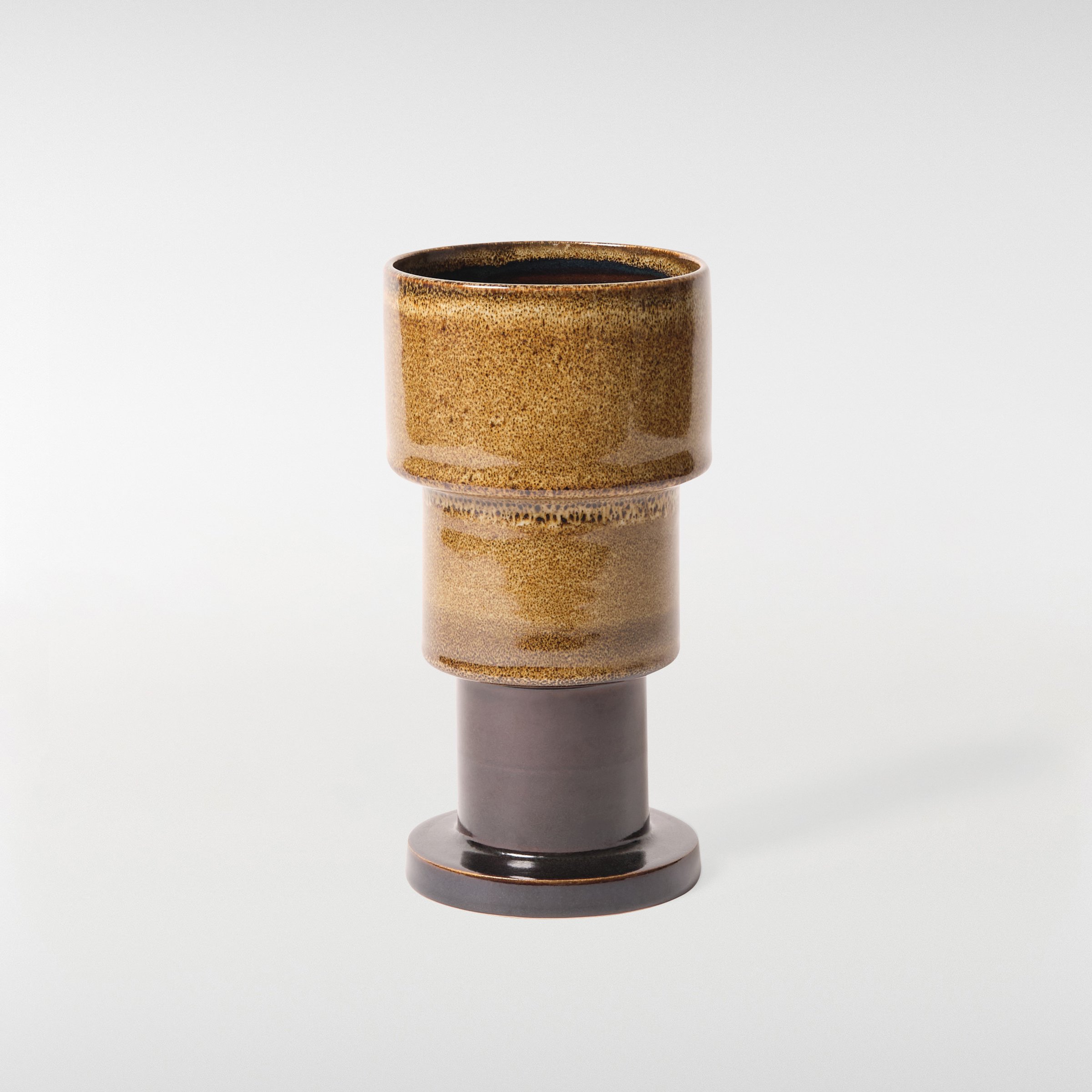 Glint Vase 1 in brown glaze, sculptural ceramic vase with stacked cylindrical form