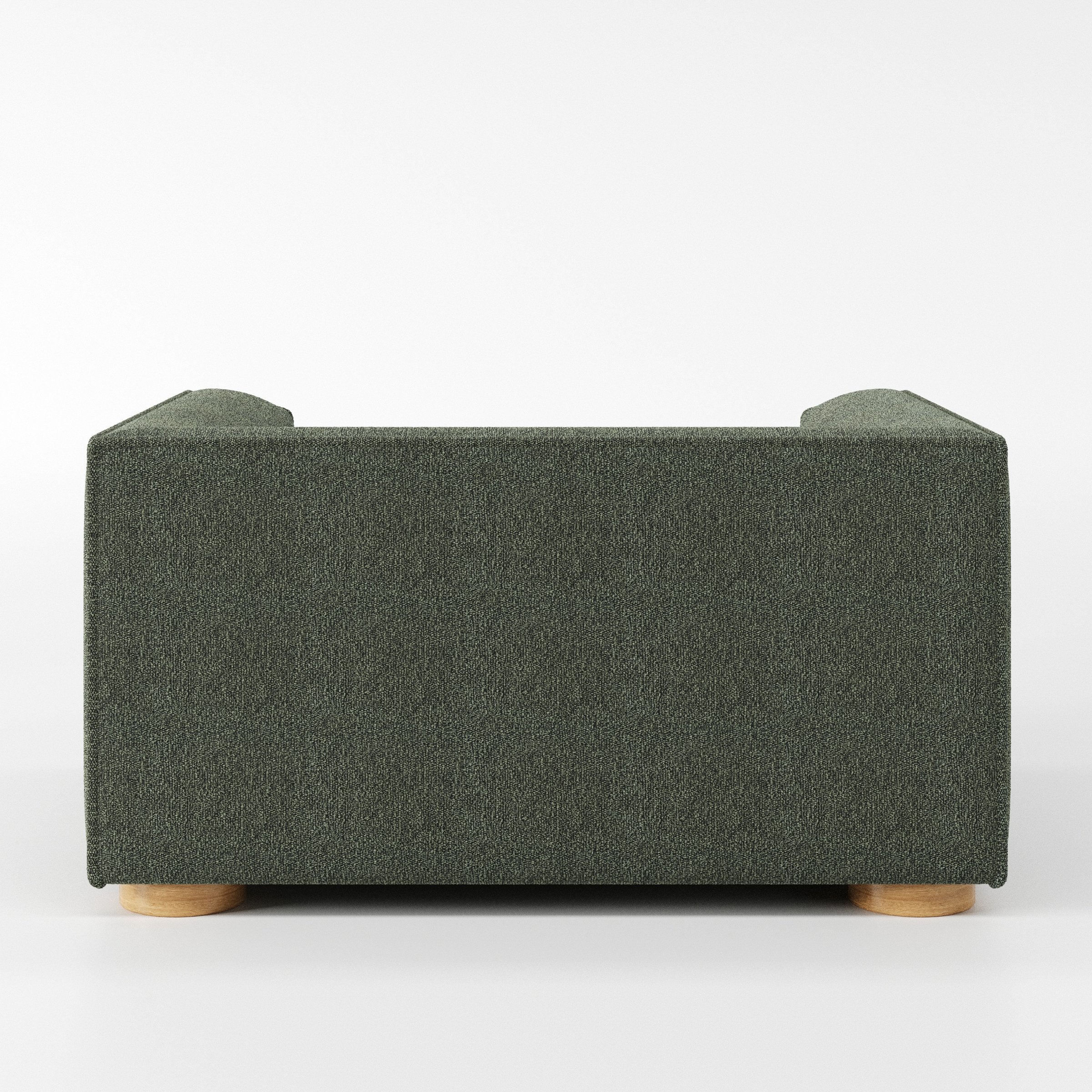 Feale armchair in Kilda Boucle Moss shown from the rear highlighting backrest shape and upholstery finish.
