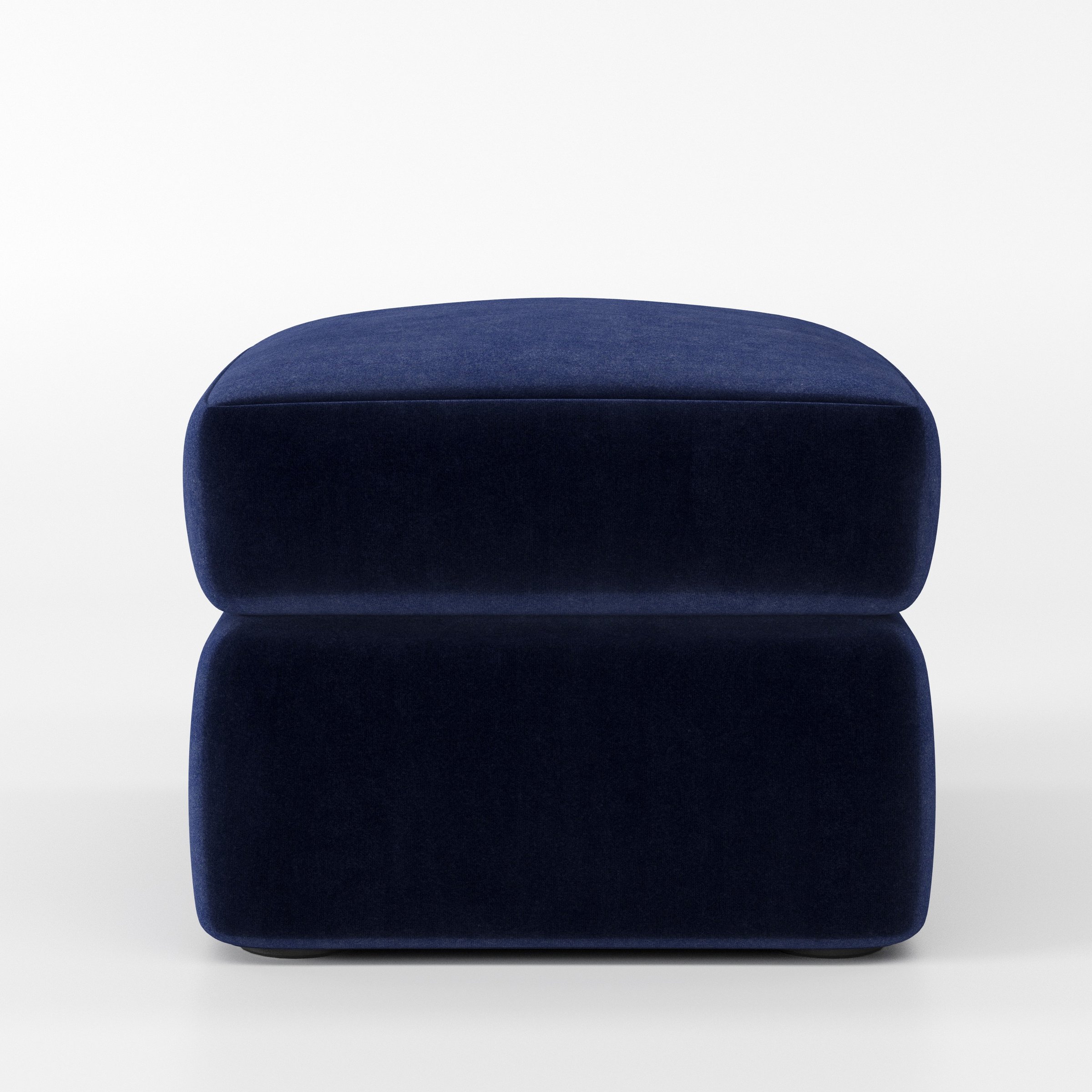 Coniston footstool in Noss Velvet Navy shown front-on against a neutral studio backdrop.