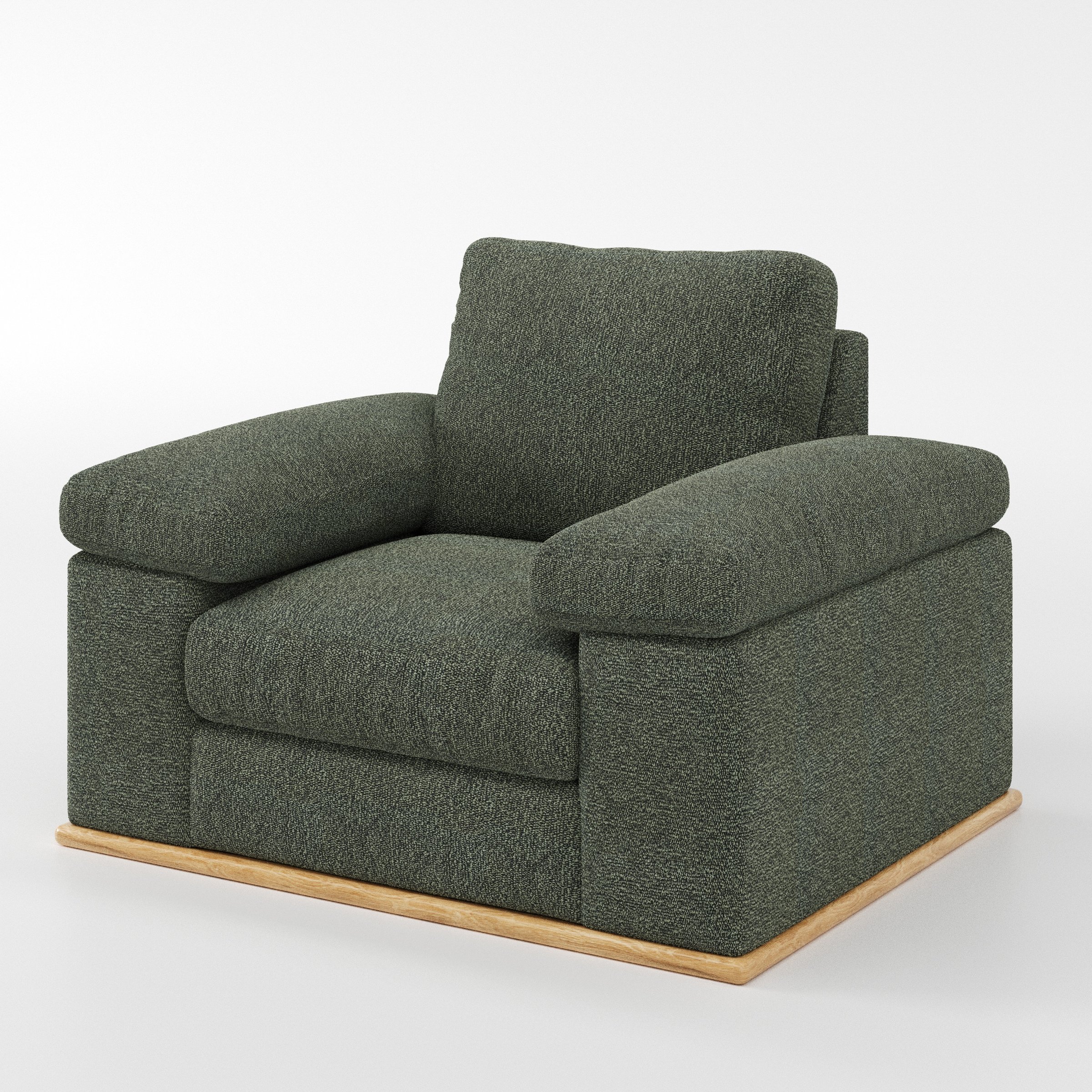 Cusher armchair in Kilda Boucle Moss shown at a diagonal angle highlighting arms and seat depth.