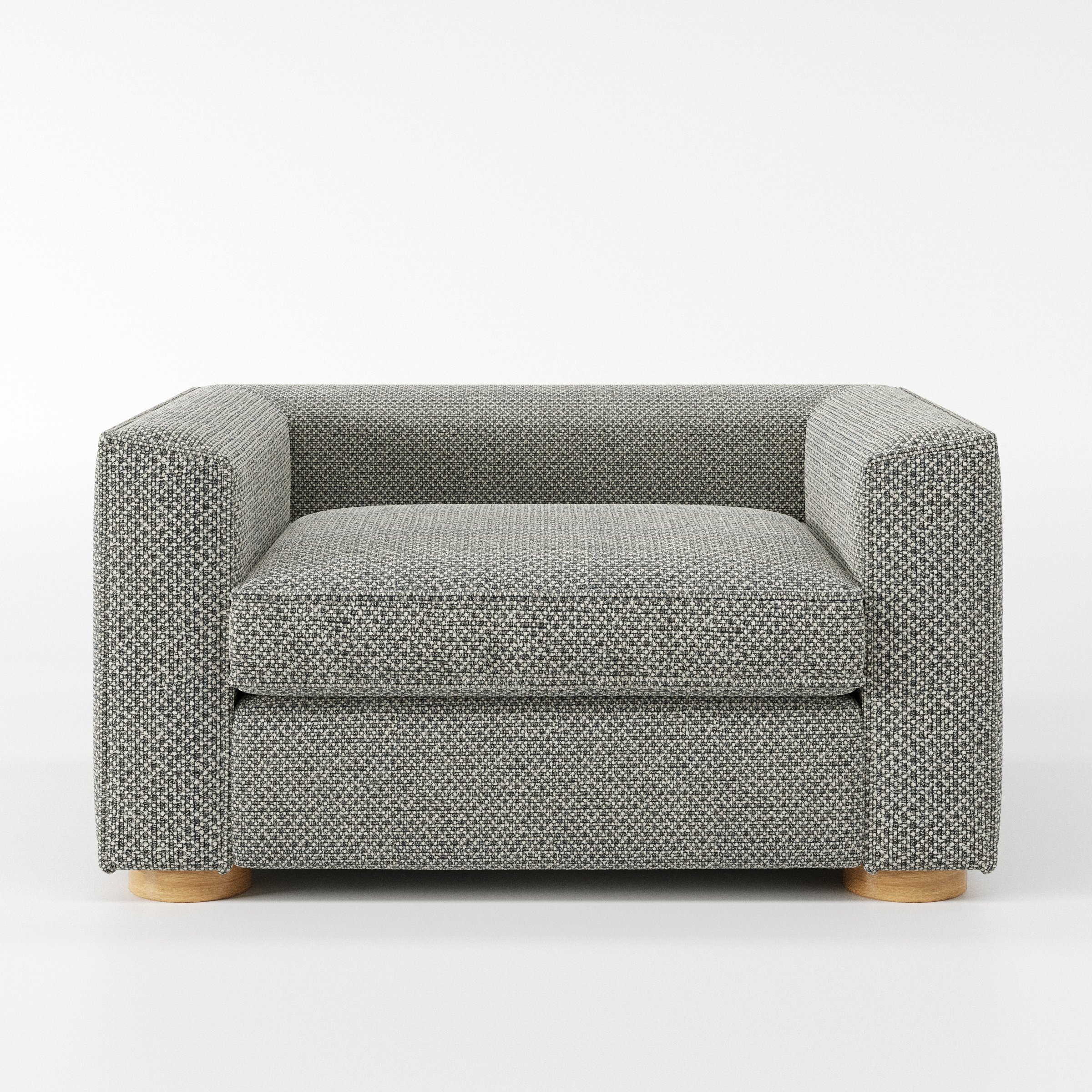 Feale armchair in Rousay Wool Blend Tar and Chalk shown front-on against a neutral studio backdrop.