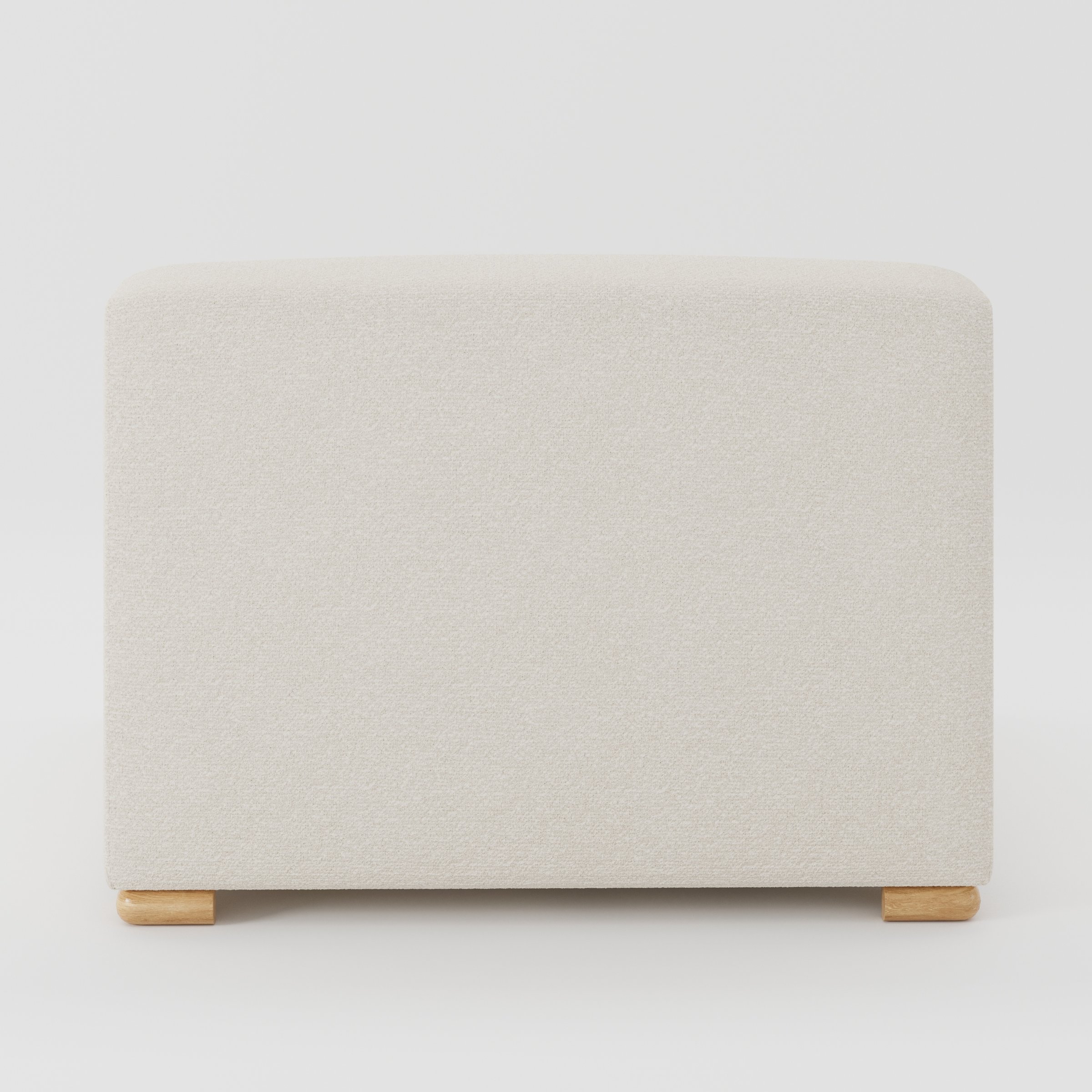 Tay single sofa unit in Kilda Bouclé Cream shown from the back with a clean, softly curved silhouette and timber feet.