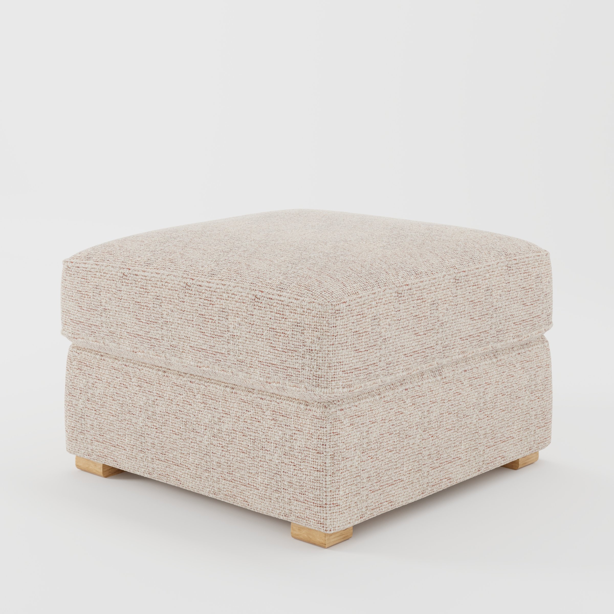 Cashel footstool in Orsay Boucle Cream and Copper shown at a diagonal angle highlighting layered cushioning and low wooden feet.