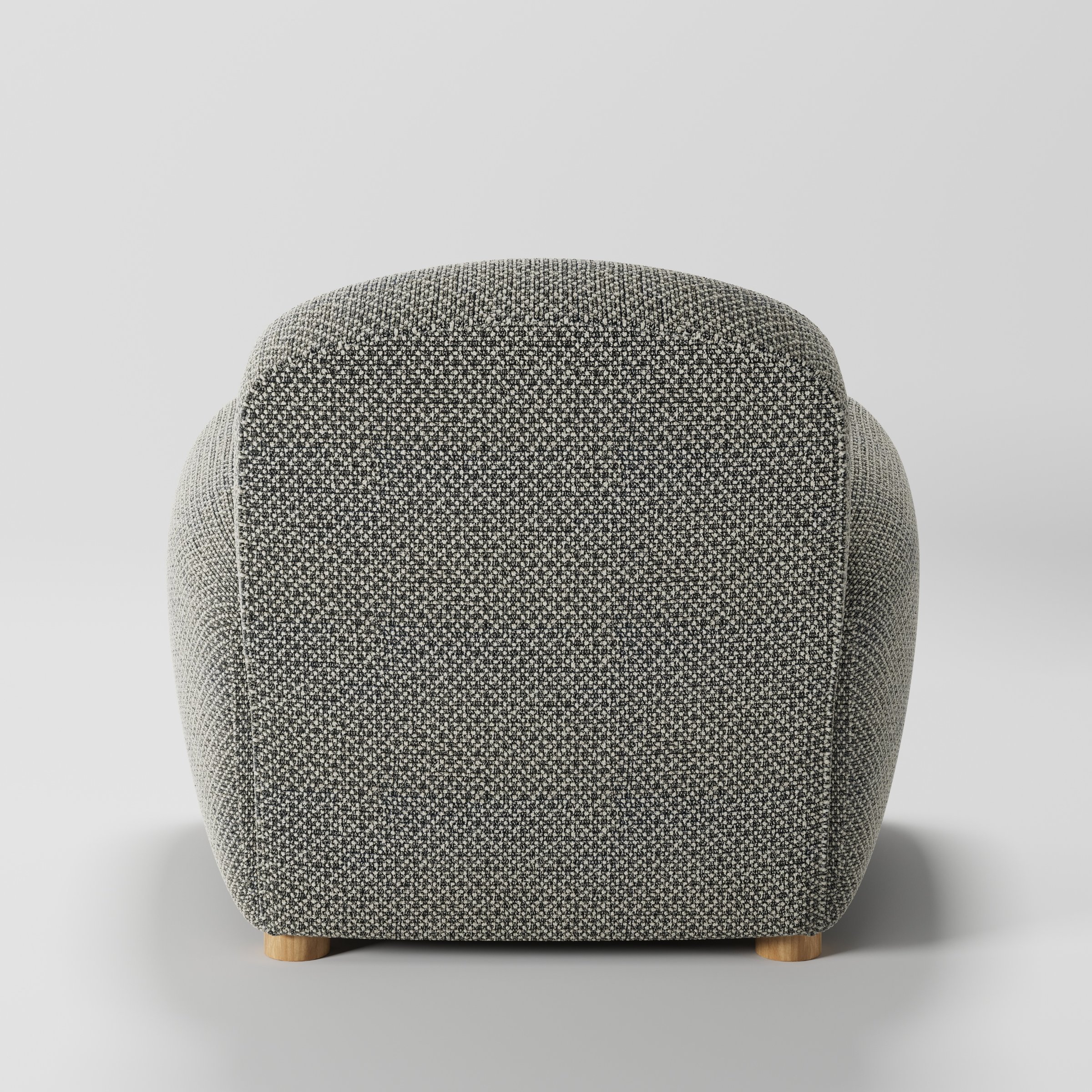 Fergus armchair in Rousay Wool Blend Tar and Chalk shown from the rear highlighting backrest shape and upholstery finish.