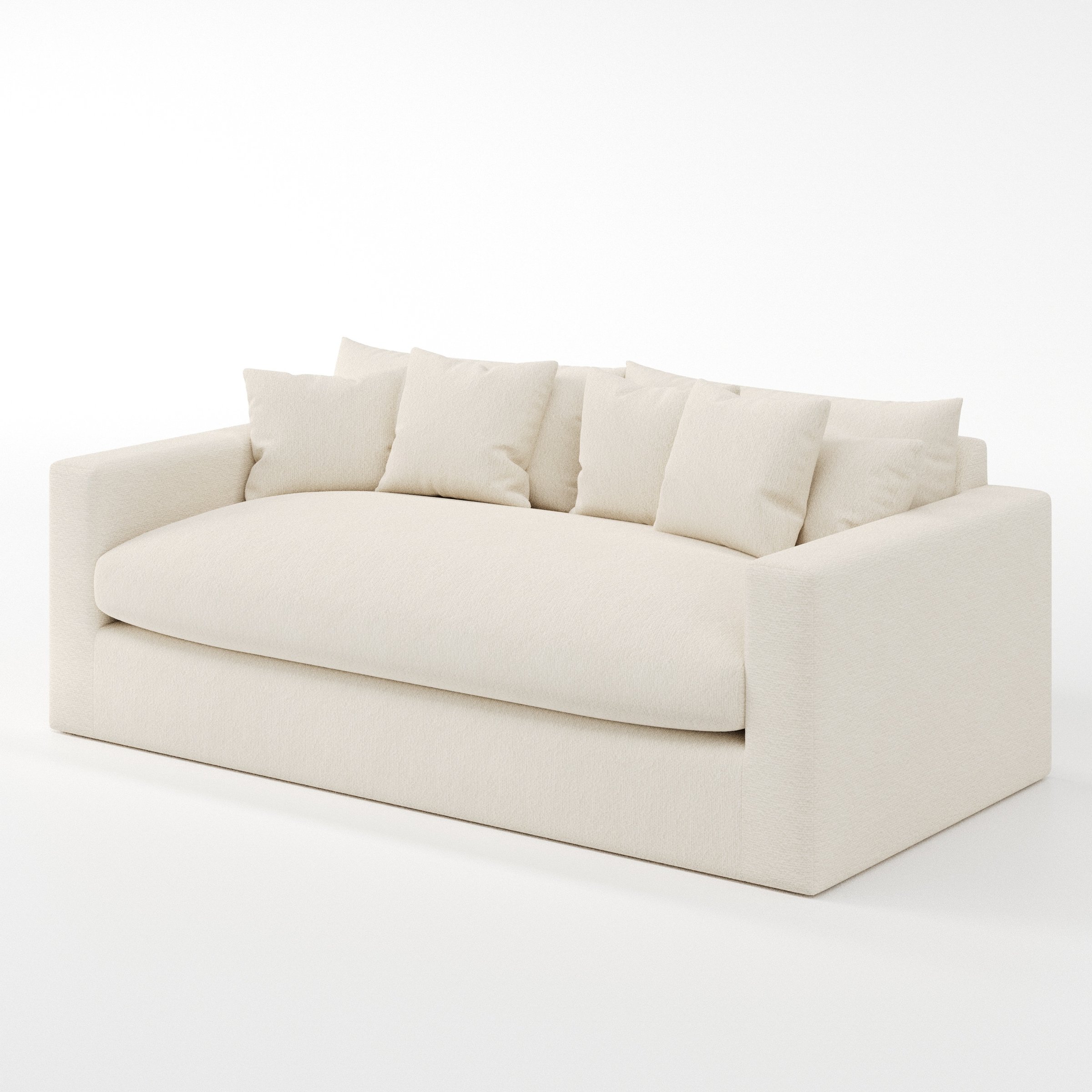 Coniston sofa in Kilda Boucle Cream shown at a diagonal angle highlighting arm profile and seat depth.