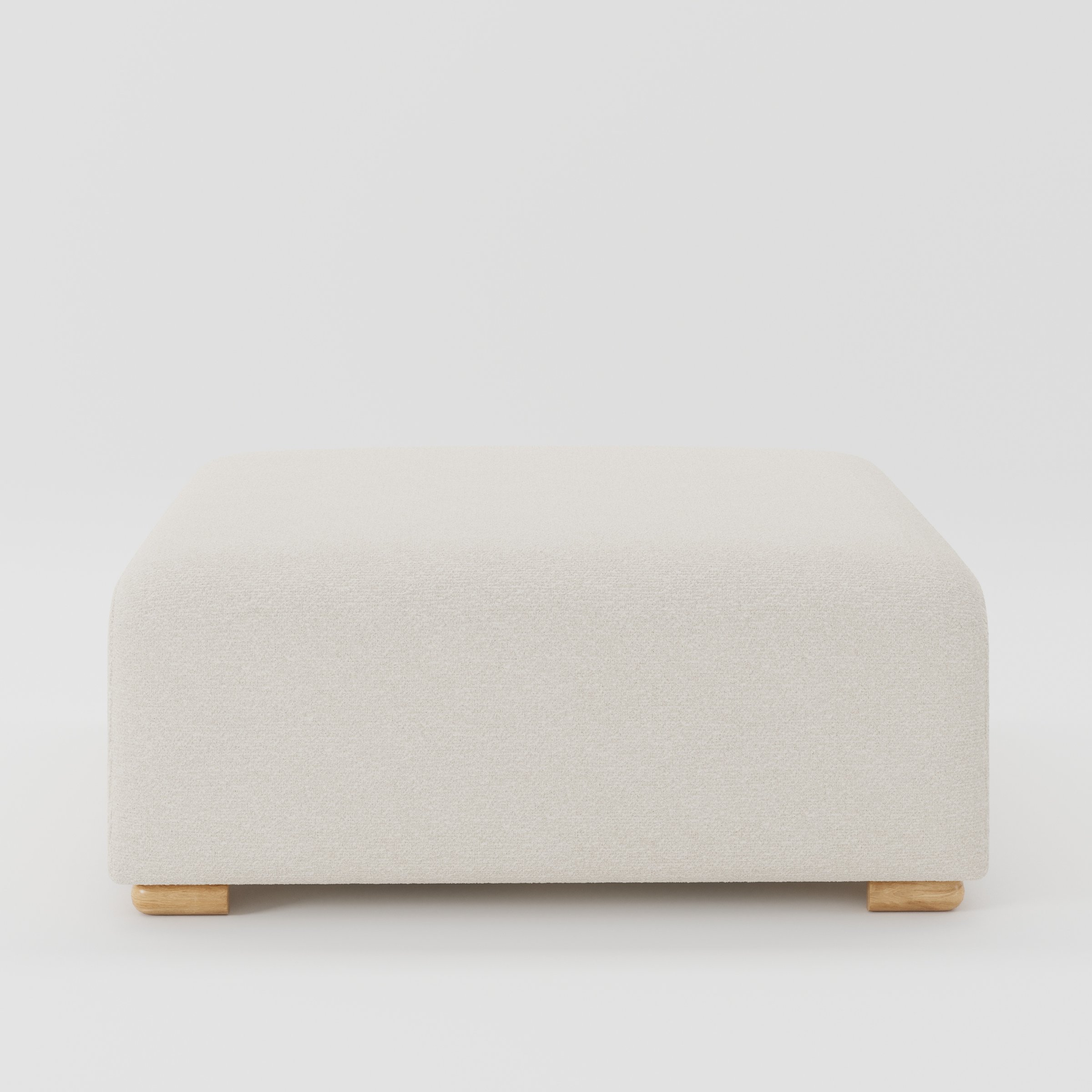 Tay footstool in Kilda Boucle Cream shown front-on against a neutral studio backdrop.