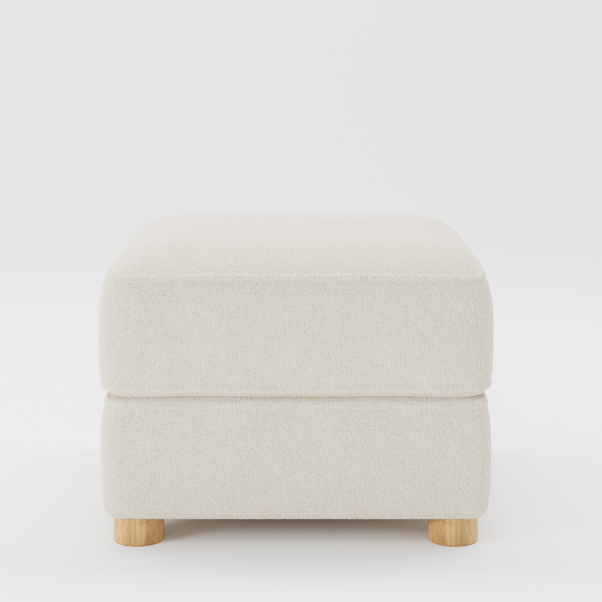 Fergus footstool in Kilda Boucle Cream shown front-on against a neutral studio backdrop.