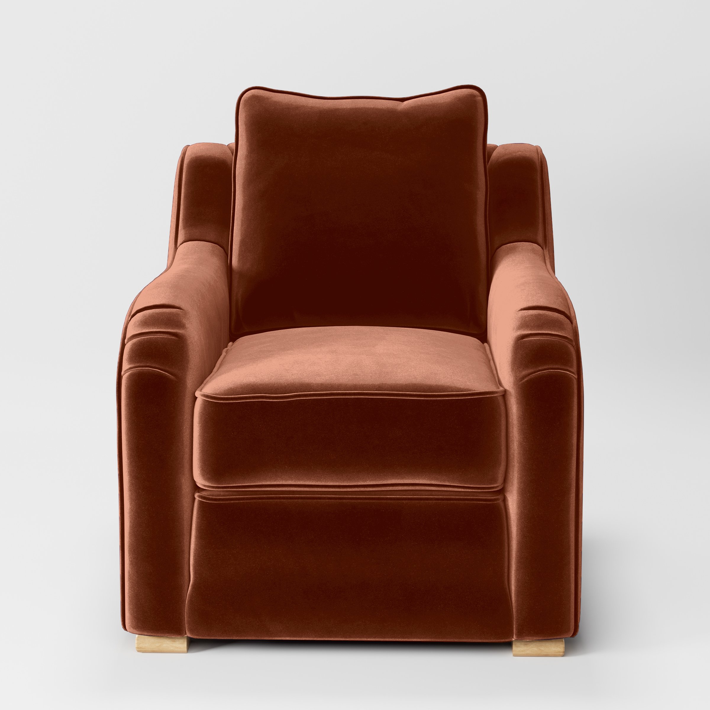 Front view of the Cashel armchair upholstered in Plush EasyClean Velvet in Apricot.