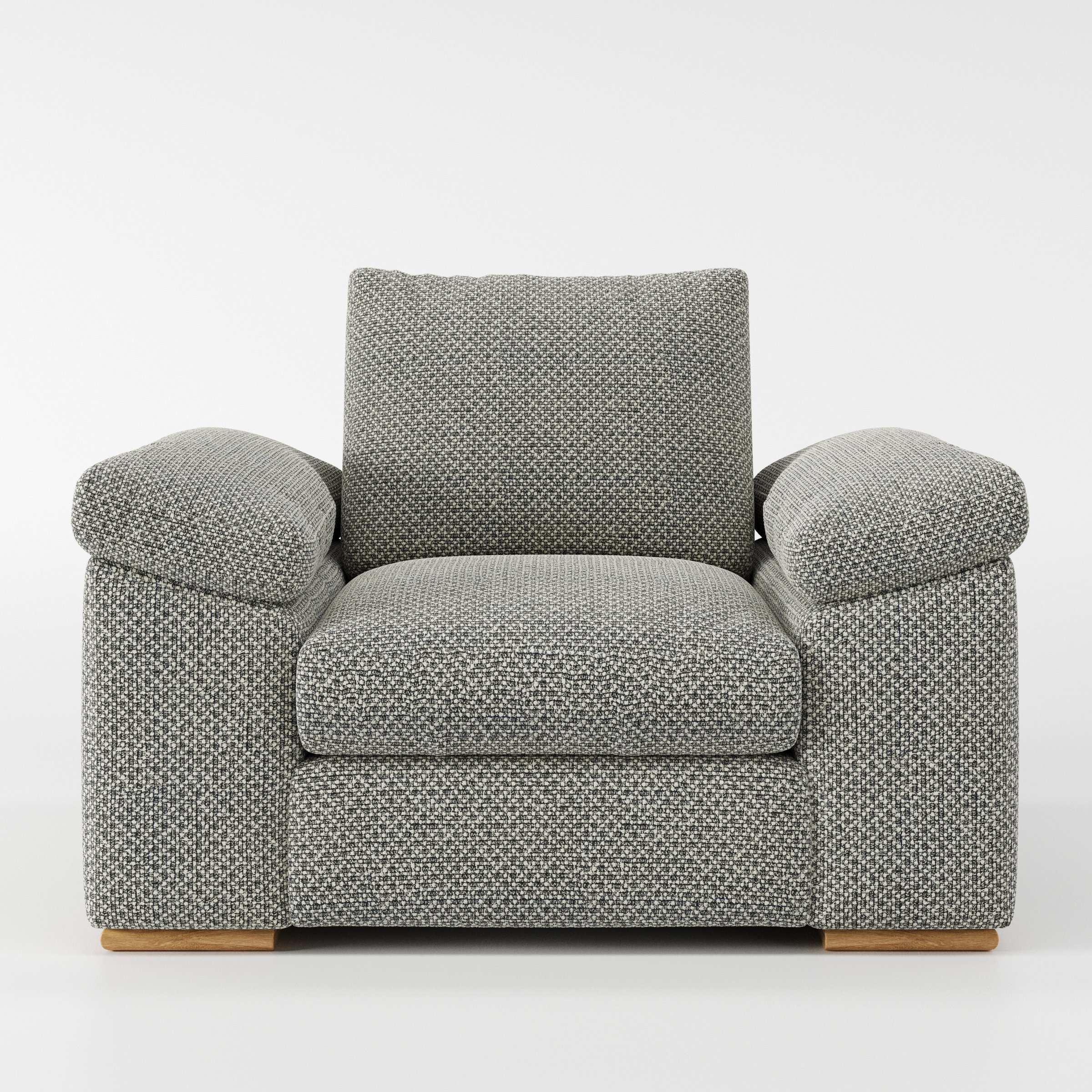 Moy armchair in Rousay Wool Blend Tar and Chalk shown front-on against a neutral studio backdrop.