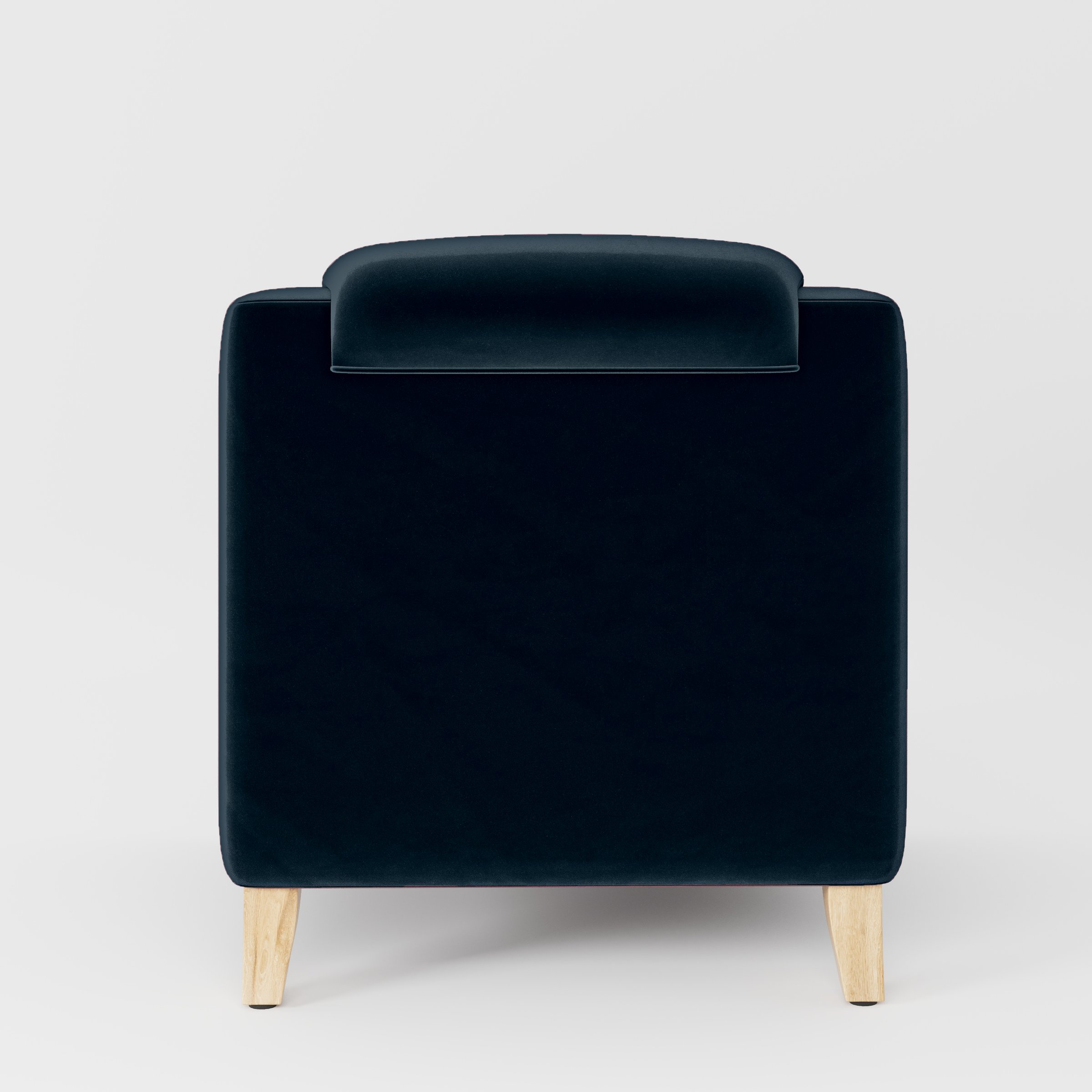 Rear view of the Erne armchair upholstered in Plush EasyClean Velvet in Navy.