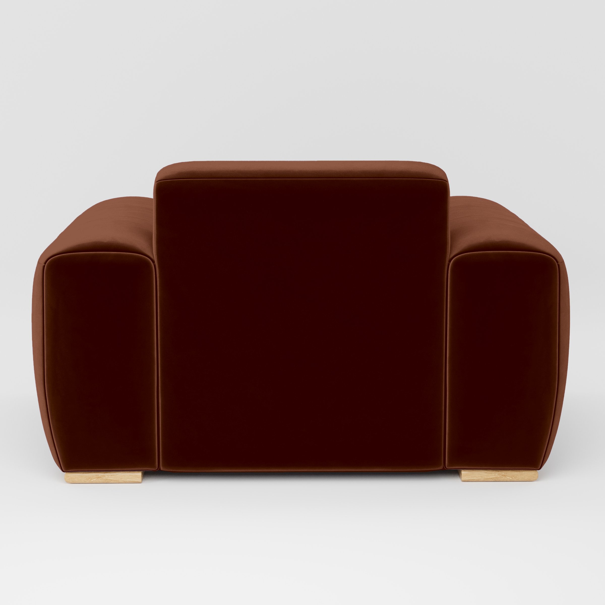 Rear view of the Darwell armchair upholstered in Plush EasyClean Velvet in Maple.