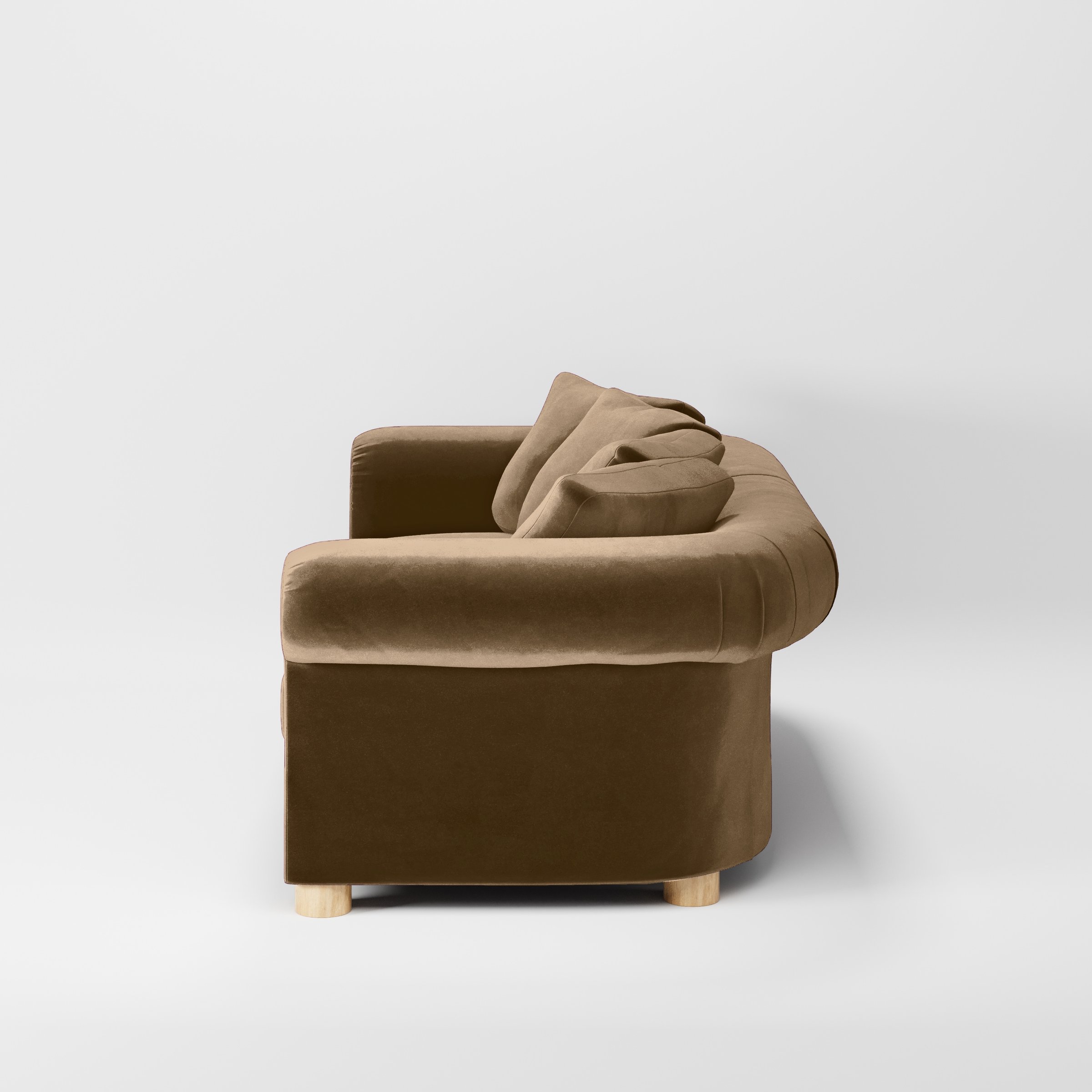 Side view of the Windermere sofa upholstered in Plush EasyClean Velvet in Caribou.